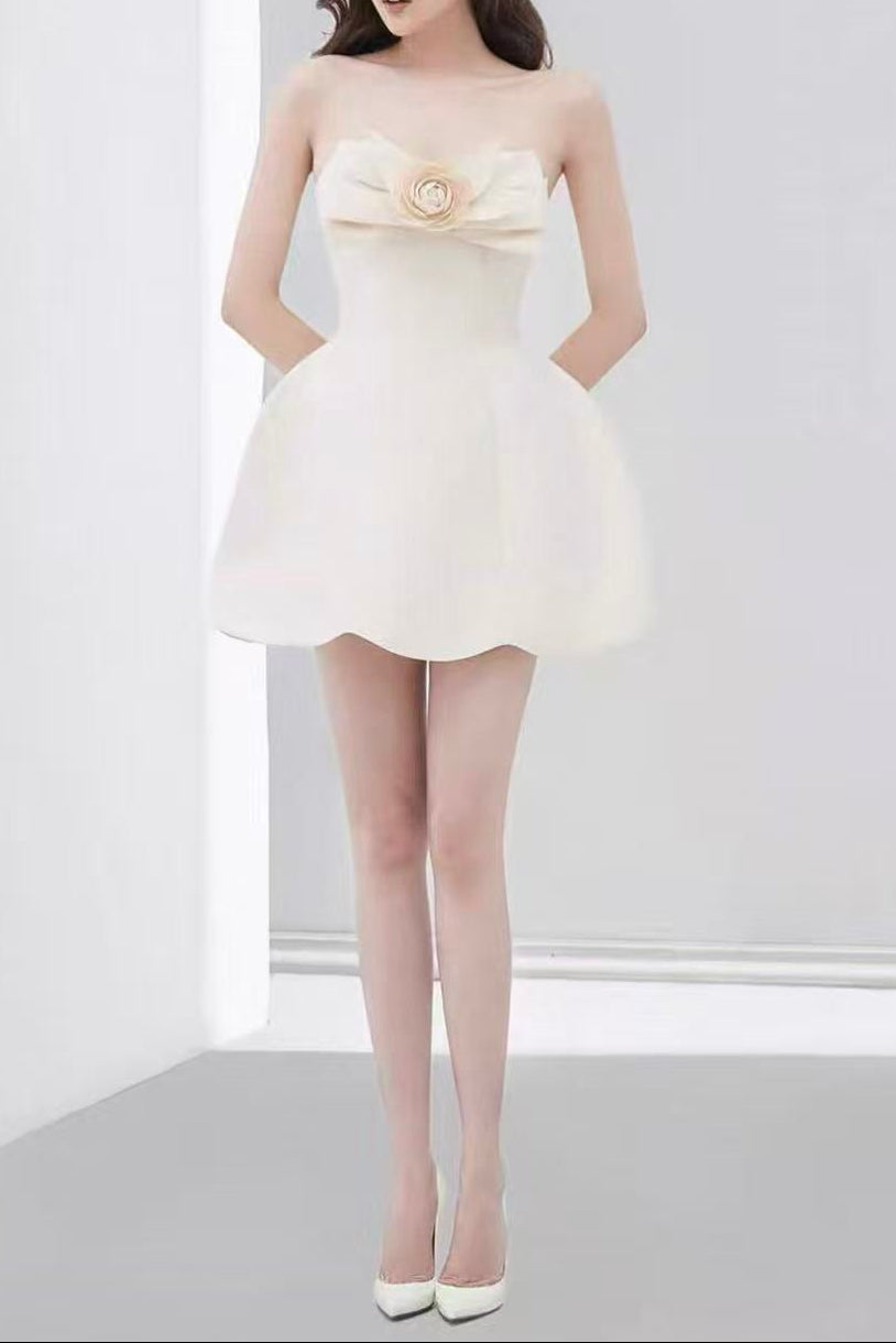 CREAM STRAPLESS MINI DRESS WITH 3D FLORAL BOW & SCALLOPED HEM