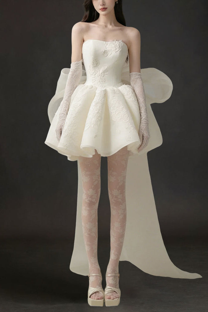 DERVLA STRAPLESS BOW MINI DRESS