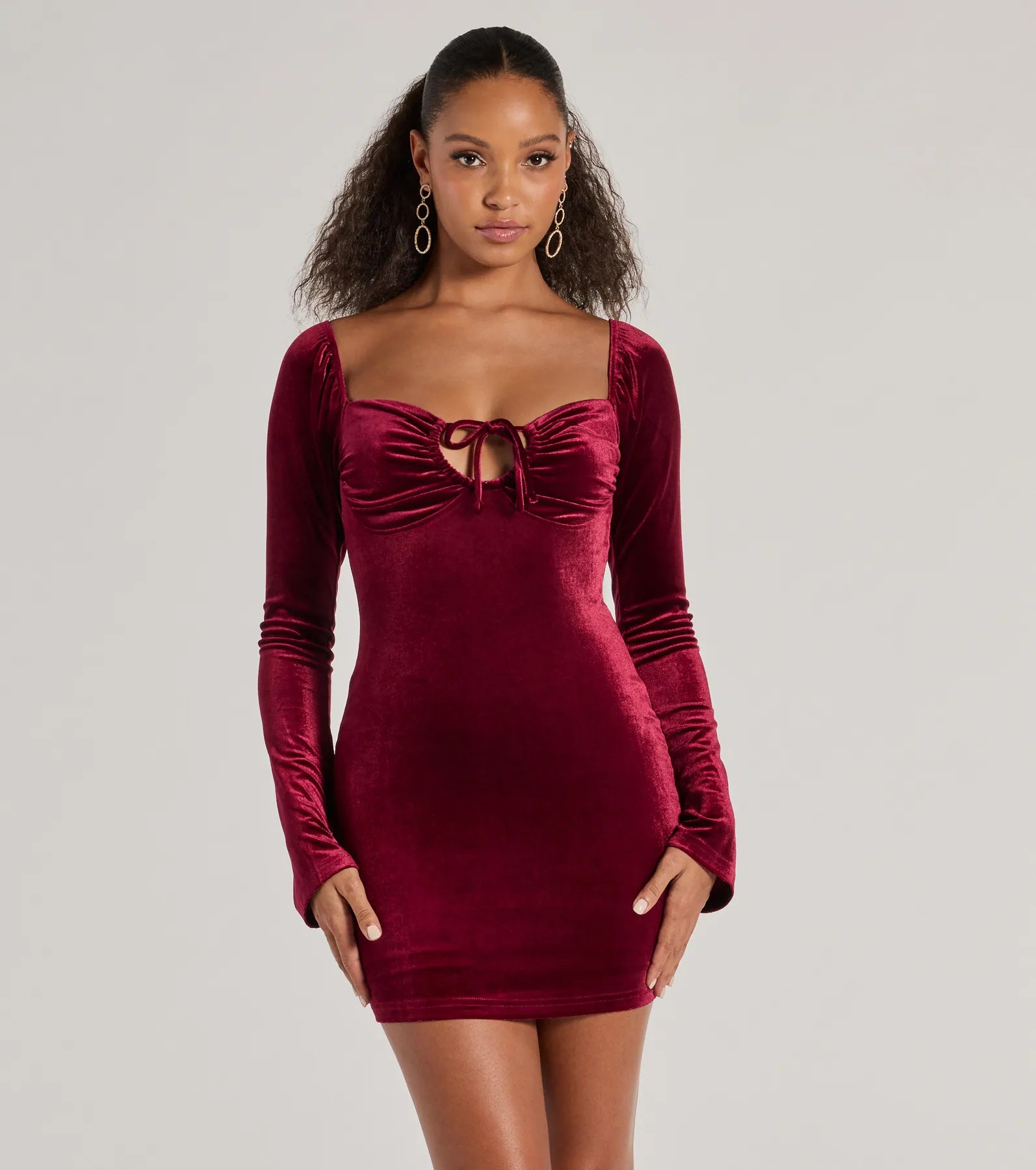 05101-3718_1_WINE_01VELVETSWTHRTBELLLONGSLVBUSTTIEMINI051013718625_757dae96-d743-4e04-9a5a-d79eaba47ac2 SEASON OF SPLENDOR VELVET MINI LONG SLEEVE PARTY DRESS