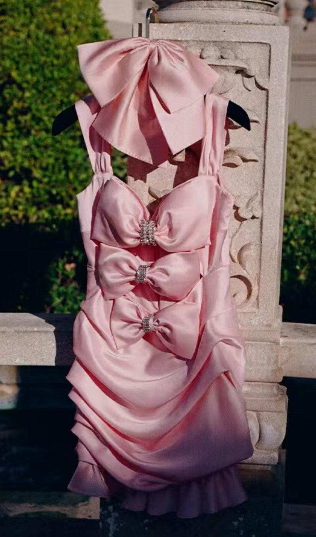 PINK RUCHED BOW CUT OUT MINI DRESS