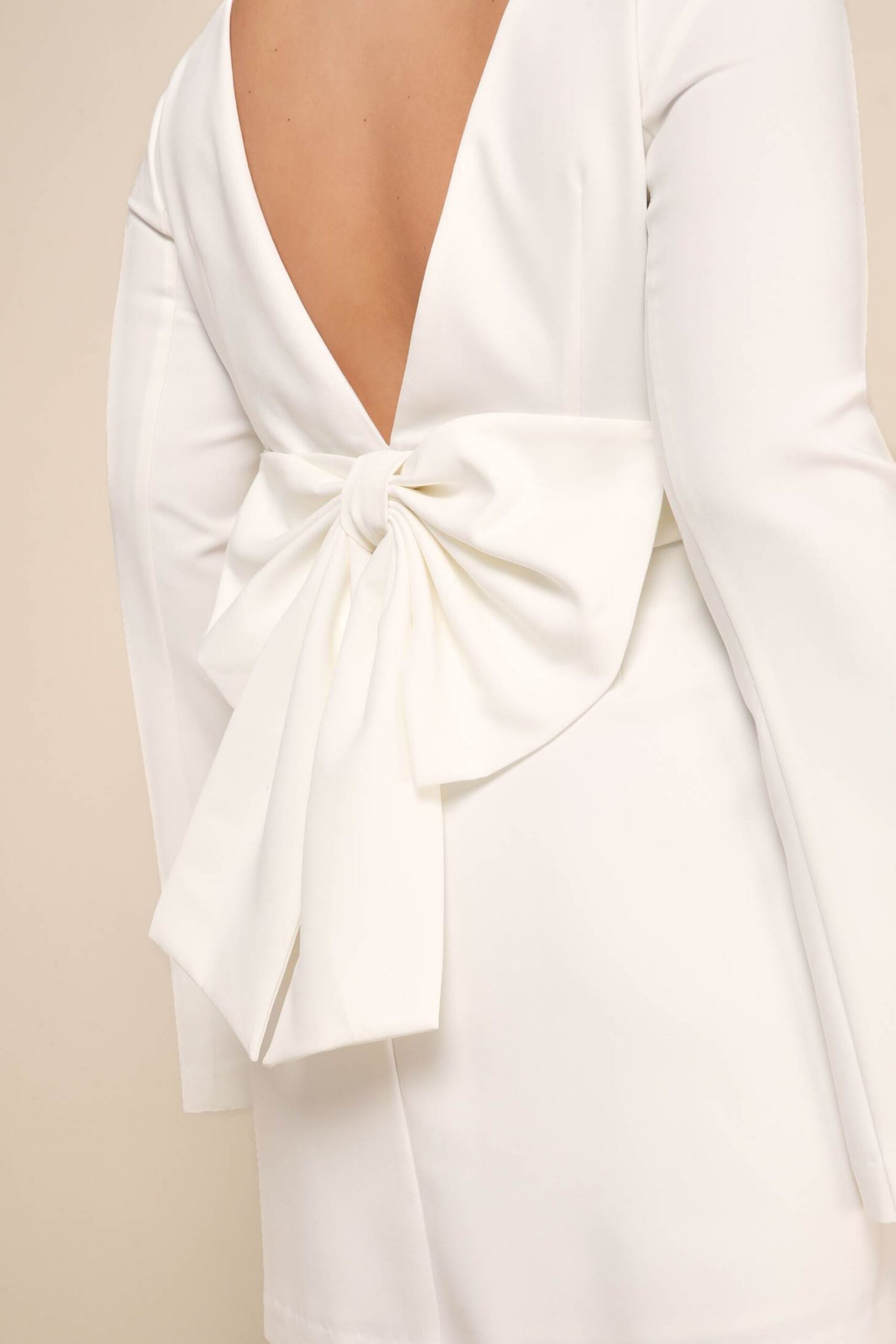IVORY BOW BACKLESS LONG SLEEVE MINI DRESS