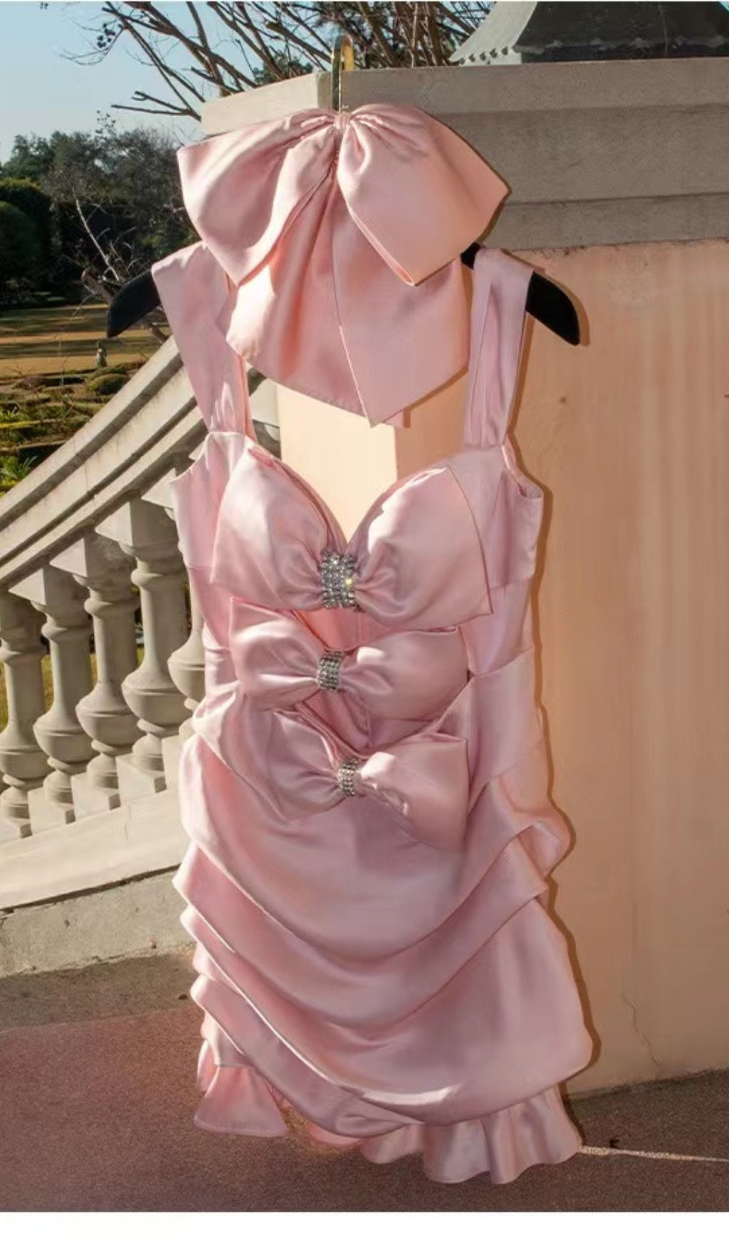 PINK RUCHED BOW CUT OUT MINI DRESS