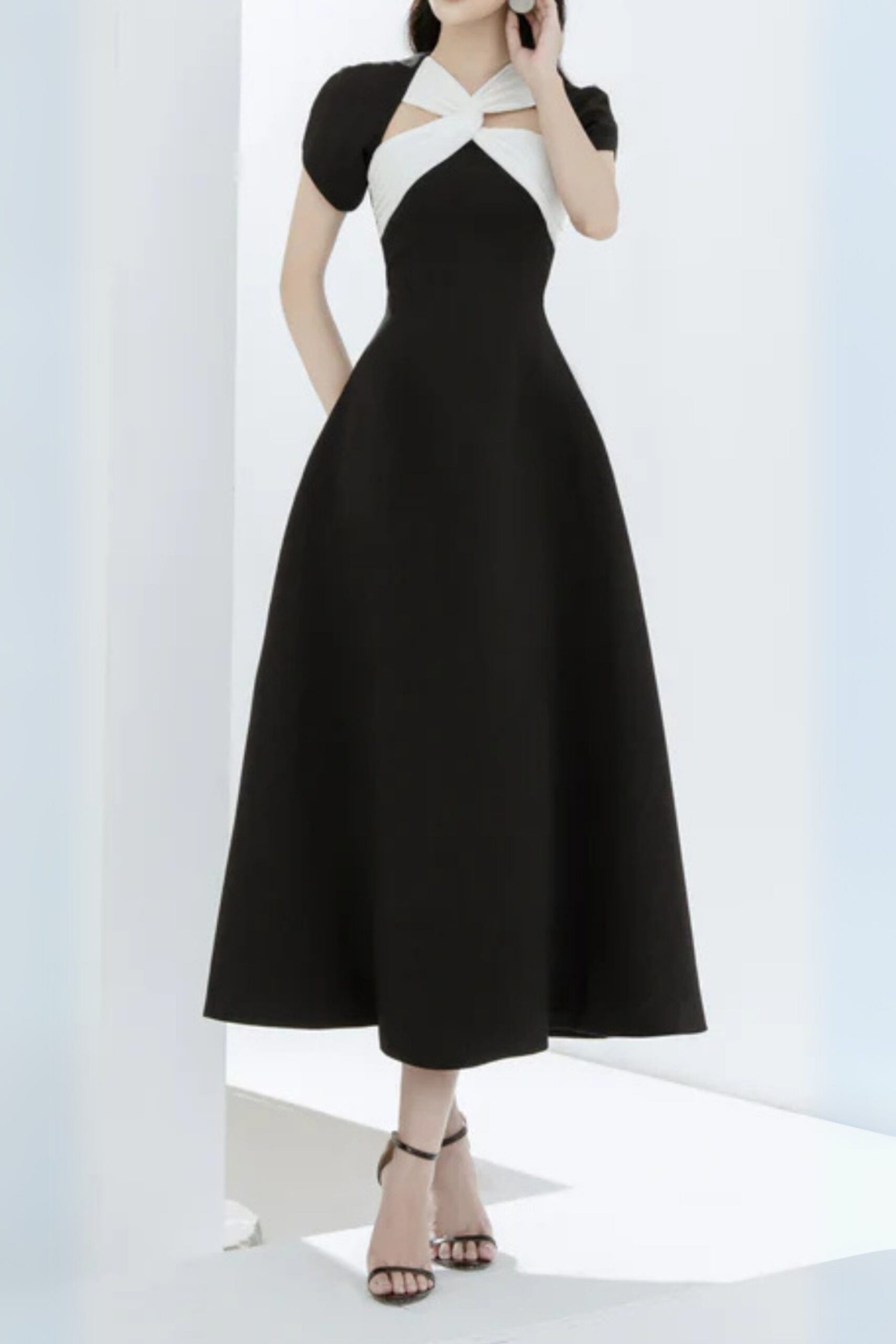 145_7b74f79d-0d20-450f-bd7f-163d3645f73d ANDREA CUT-OUT A-LINE MIDI DRESS BLACK
