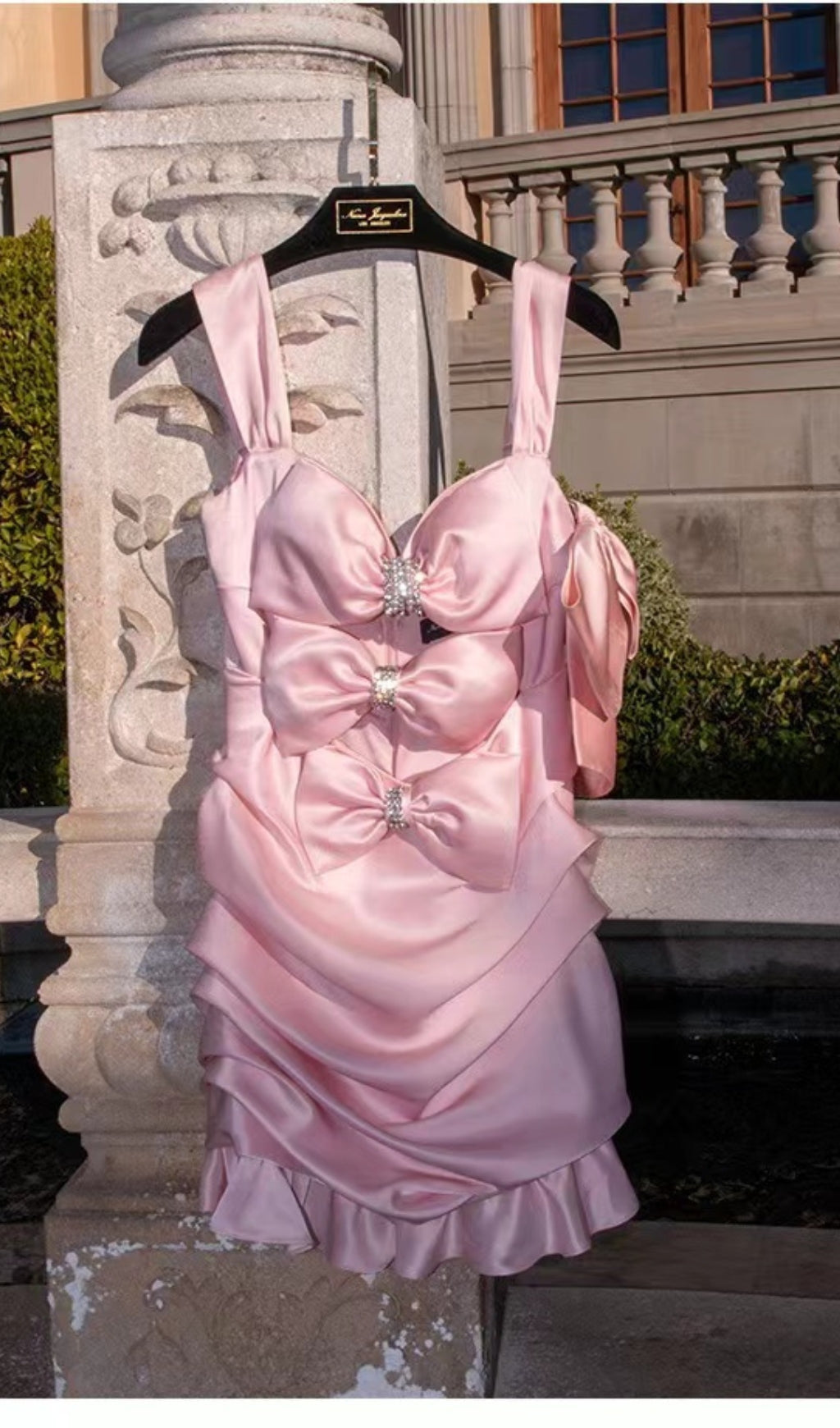 PINK RUCHED BOW CUT OUT MINI DRESS