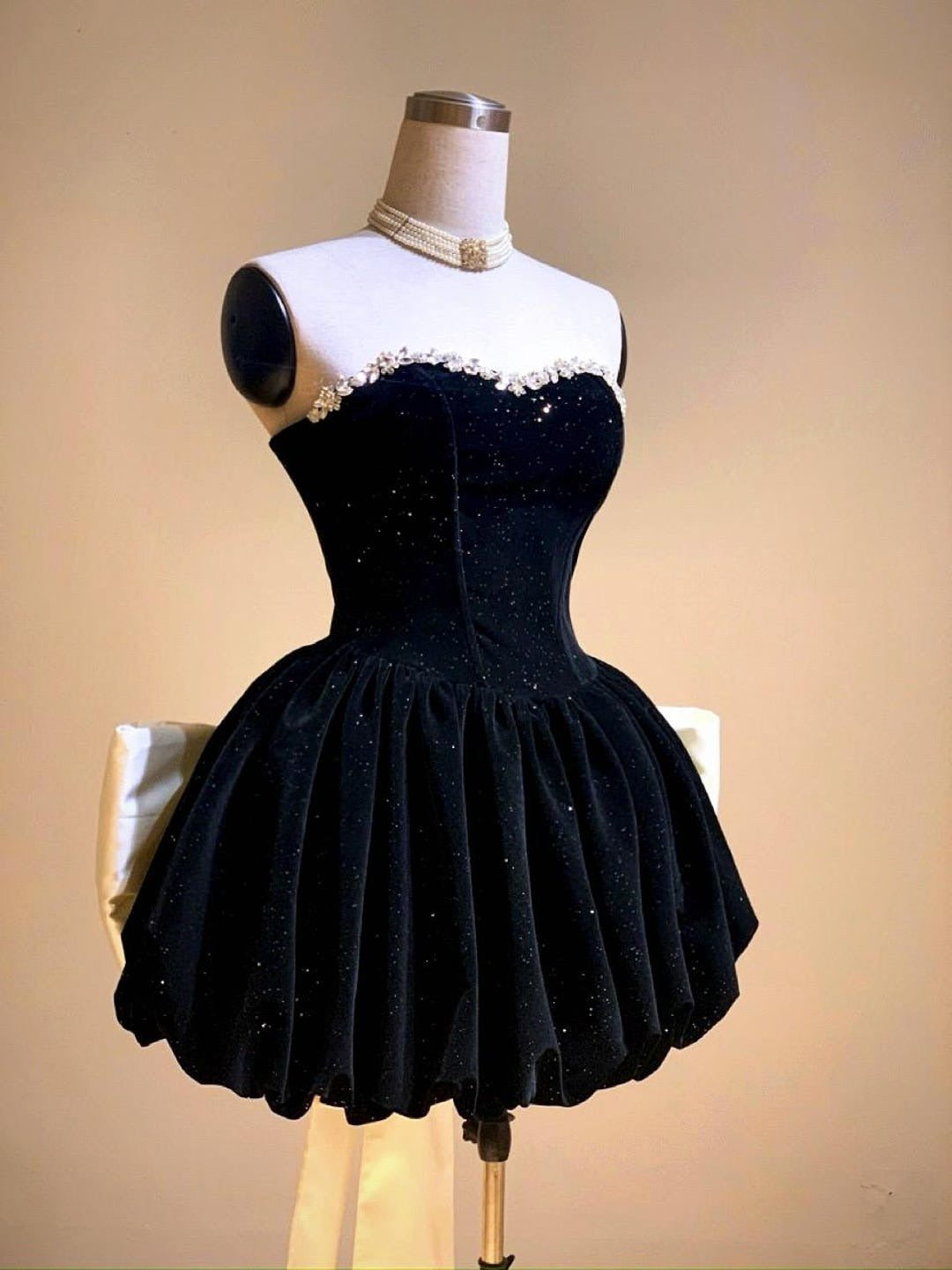 ZAAHIR RHINESTONE BOW SEQUIN STRAPLESS MINI DRESS