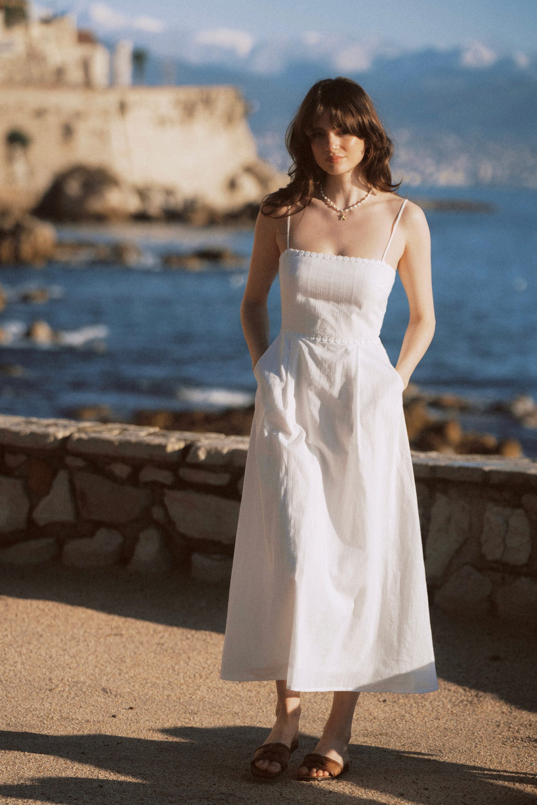 GLORIA STRAPLESS WHITE MAXI DRESS WITH FLOWER DETAIL