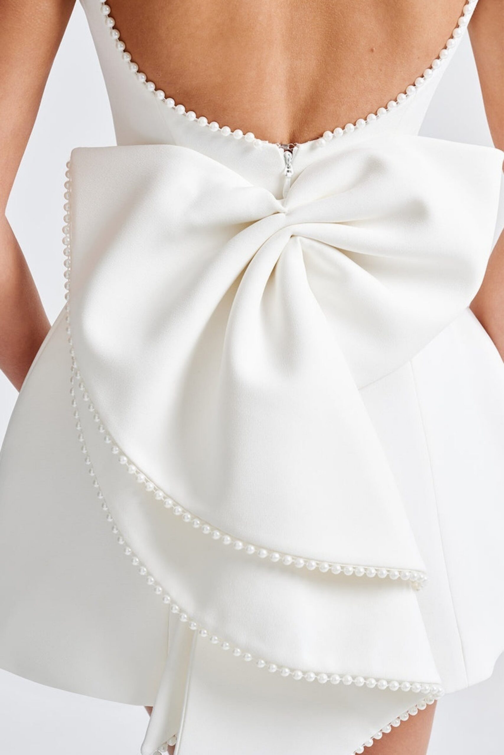 TRISTA BOWKNOT PEARL BACKLESS WHITE MINI DRESS