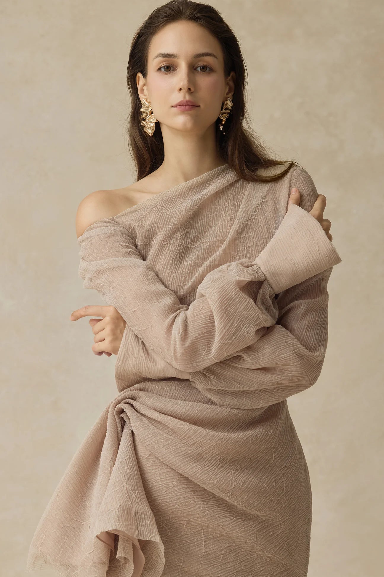 BRIANNA ASYMMETRIC PLEATED MAXI DRESS IN BEIGE