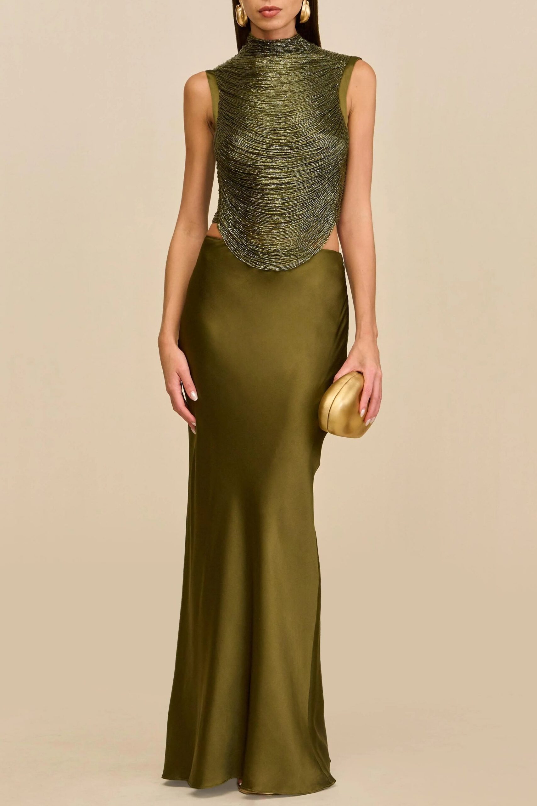 7a94e6cb-6fed-4ec8-94e3-8e1de4fdcb20 SLEEVELESS TURTLENECK TASSEL SKIRT SET, GREEN WEDDING GUEST OUTFIT