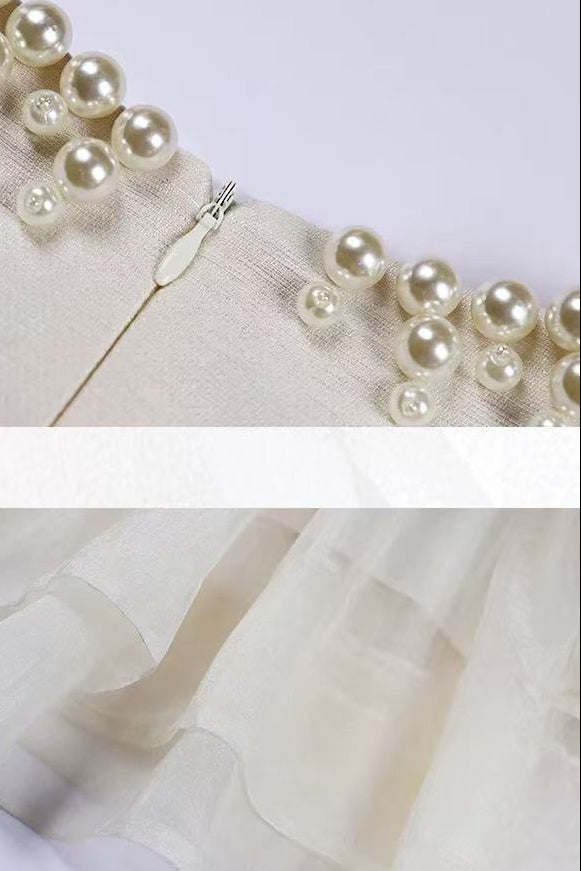 SLEEVELESS IVOIRE MIDI DRESS, TULLE SKIRT, PEARL COLLAR