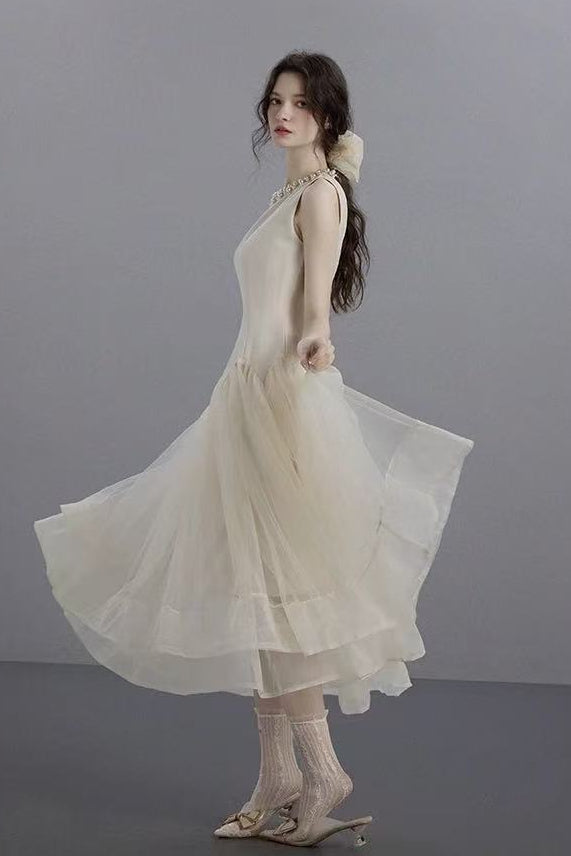 SLEEVELESS IVOIRE MIDI DRESS, TULLE SKIRT, PEARL COLLAR