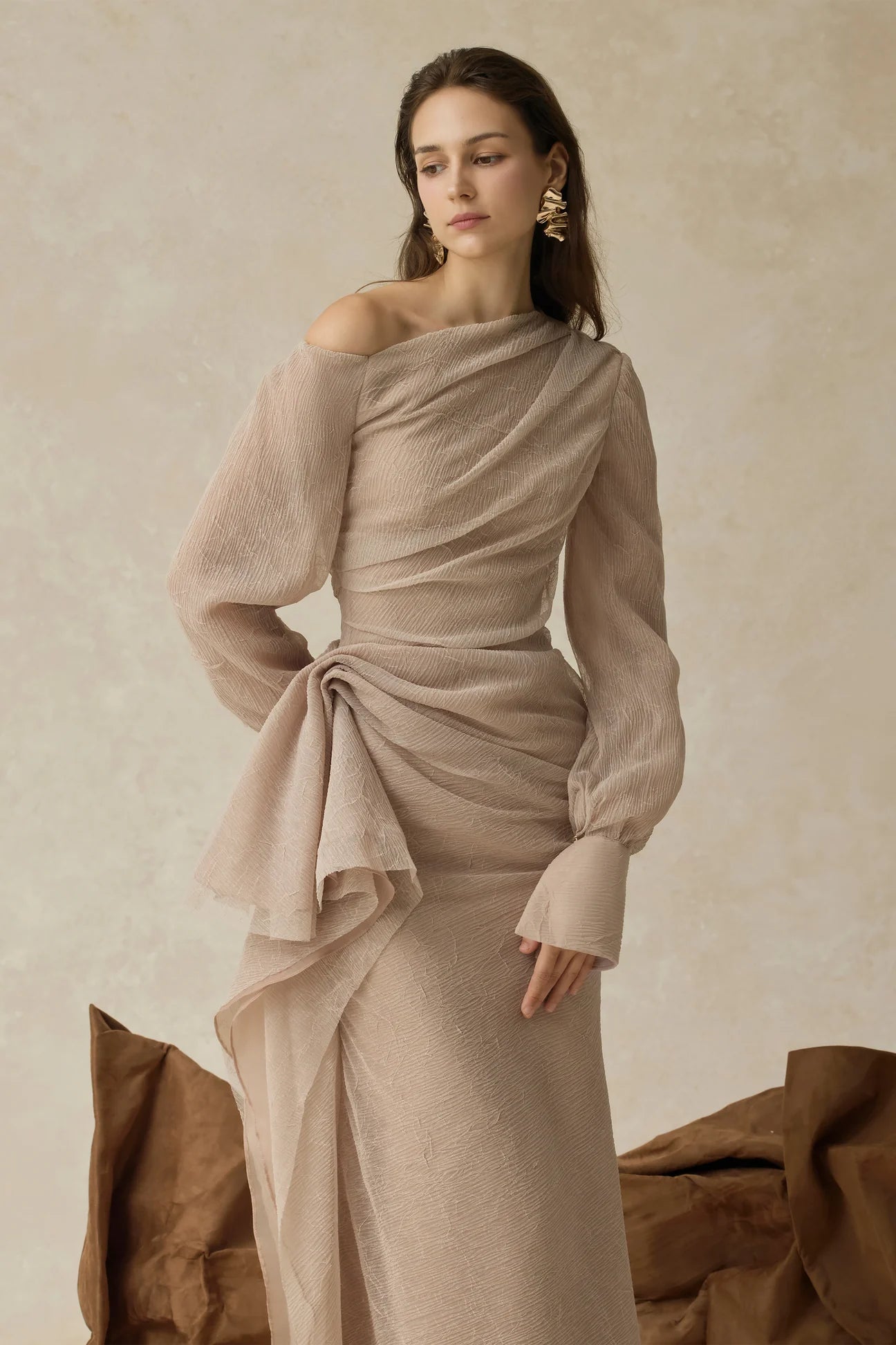 BRIANNA ASYMMETRIC PLEATED MAXI DRESS IN BEIGE