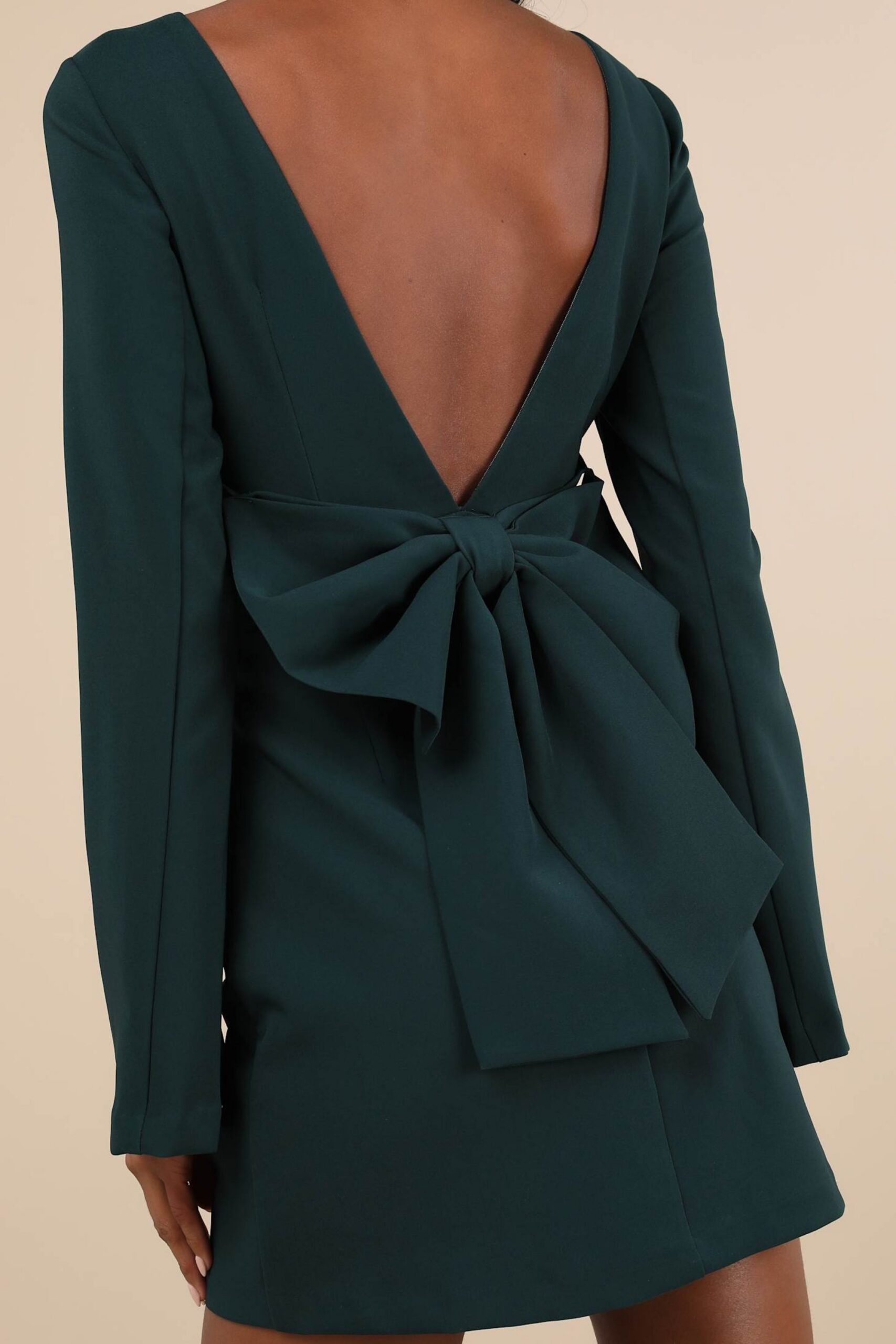 EMERALD BOW BACKLESS MINI DRESS, LONG SLEEVE