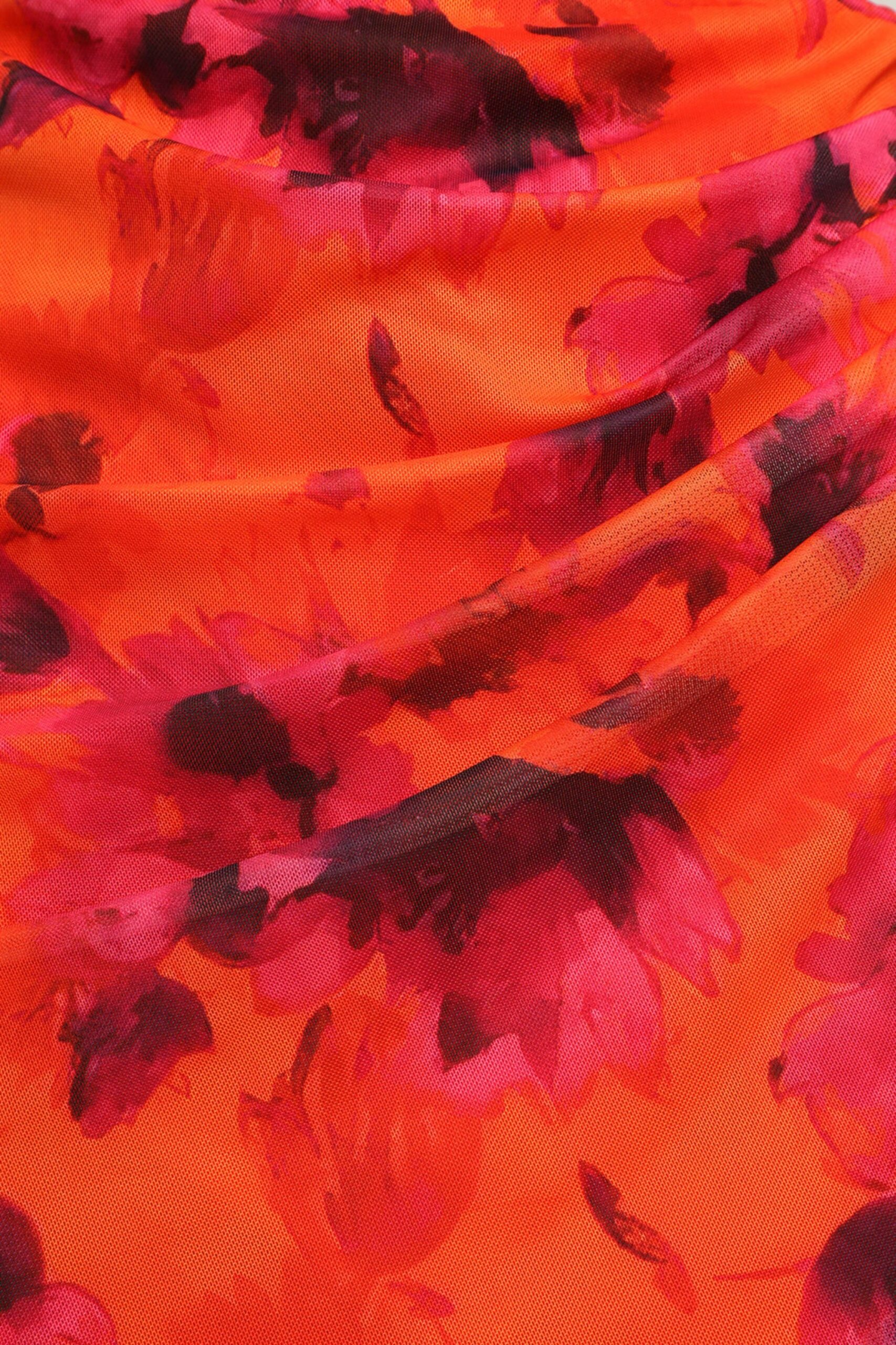 ORANGE FLORAL BACKLESS LACE-UP MINI DRESS