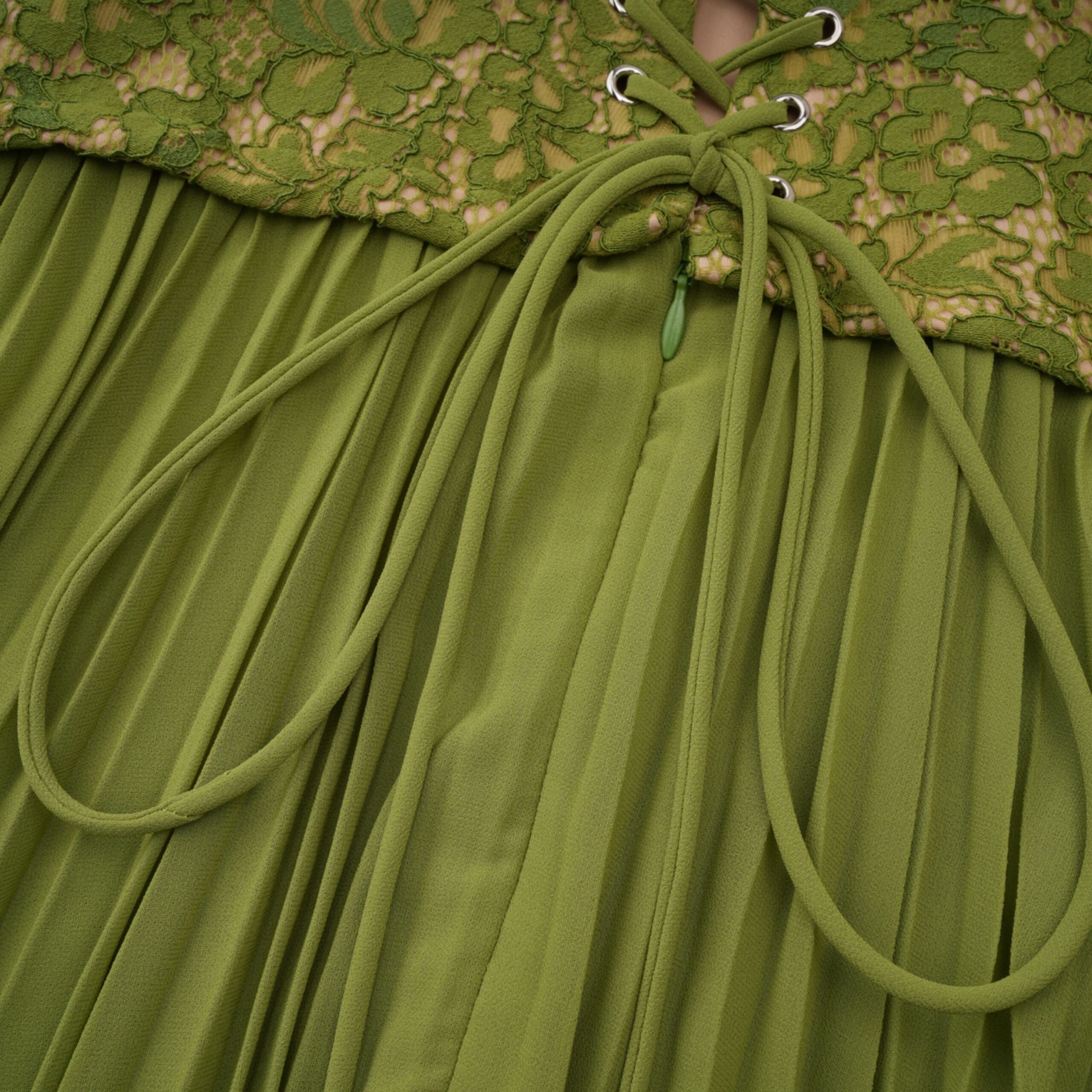 EMERALD LACE FISHBONE CORSET GOWN, PLEATED SILHOUETTE