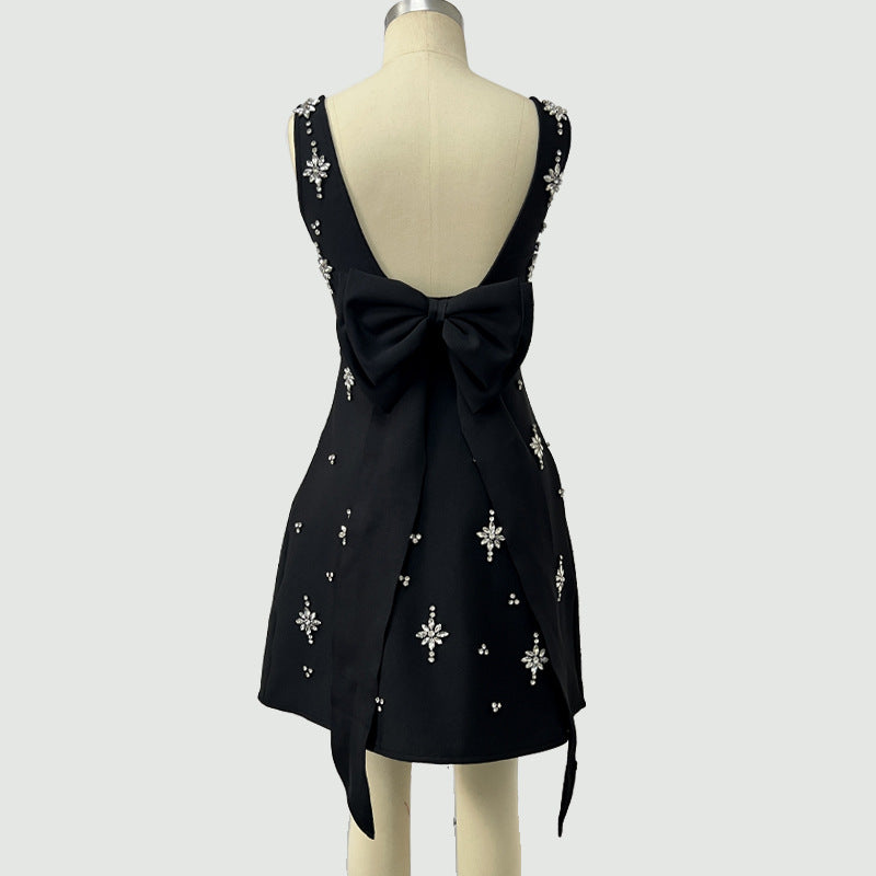 ADORA SLEEVELESS BANDAGE DIAMOND BOW MINI DRESS