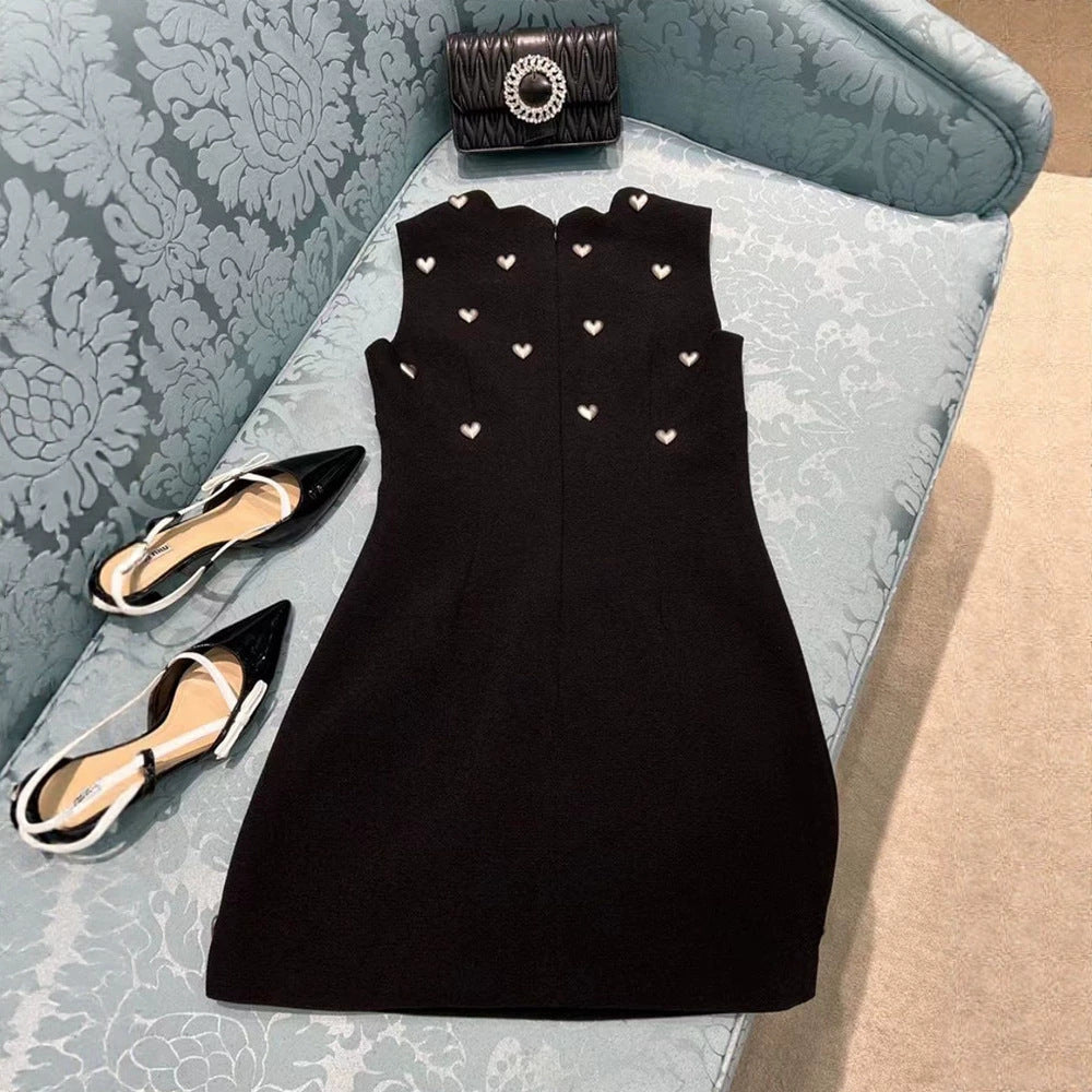 SCALLOPED NECK HEART STUD SLEEVELESS BLACK MINI DRESS