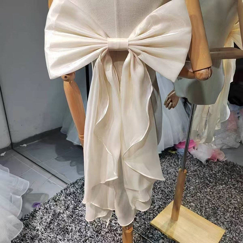 SHIMMER ORGANZA GIANT BOW SASH BACK RUFFLE