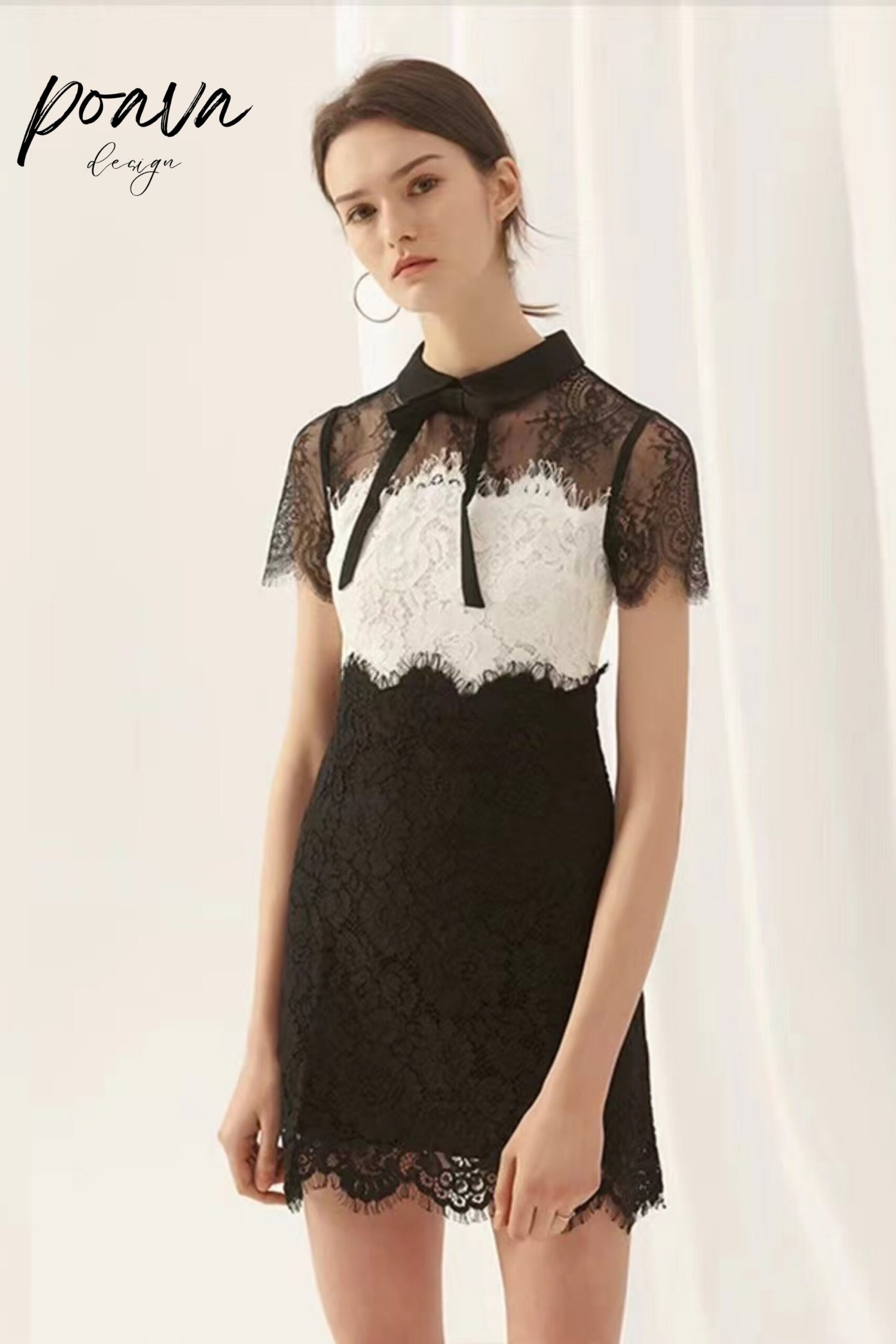 Lace white and black mini dress with bow