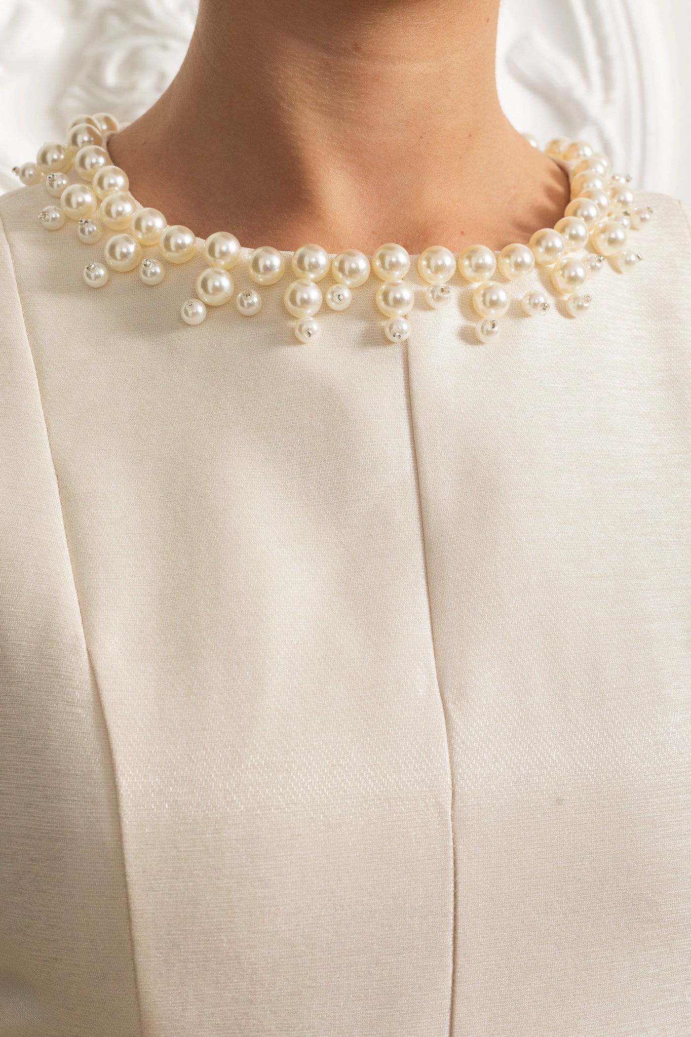 SLEEVELESS IVOIRE MIDI DRESS, TULLE SKIRT, PEARL COLLAR