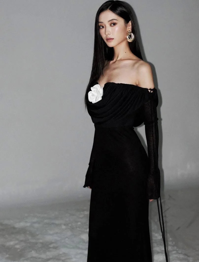 LILA BLACK PLEATED STRAPLESS MAXI DRESS WITH FLOWER EMBELLISHMENT