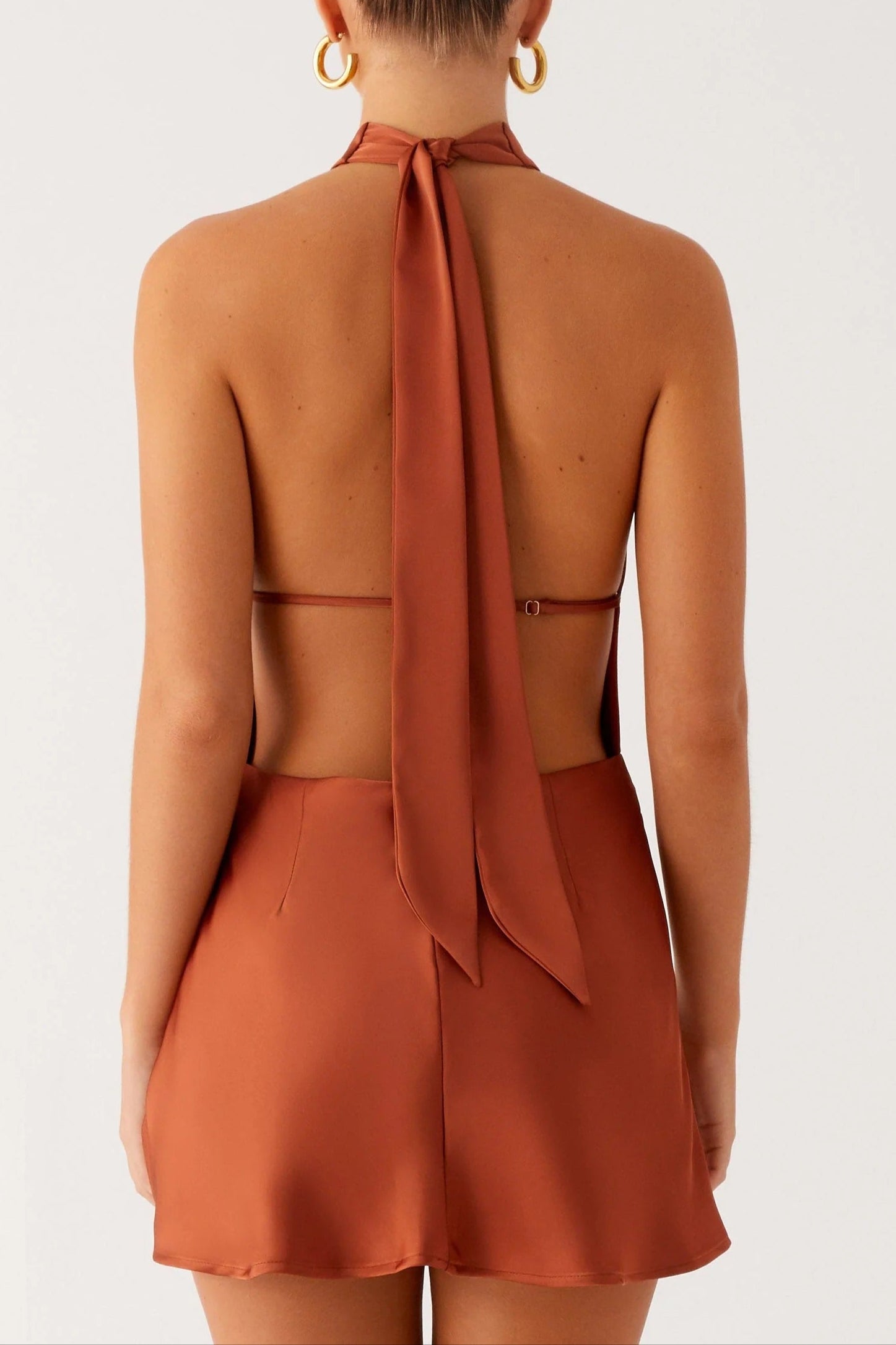 HALTER BACKLESS RUST SATIN MINI DRESS