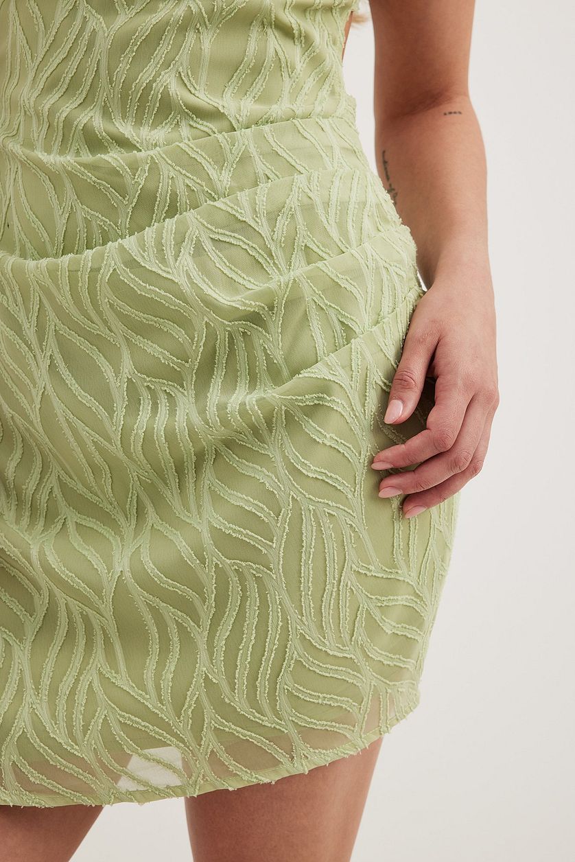 STRUCTURED GREEN MINI DRESS, BACK TIE