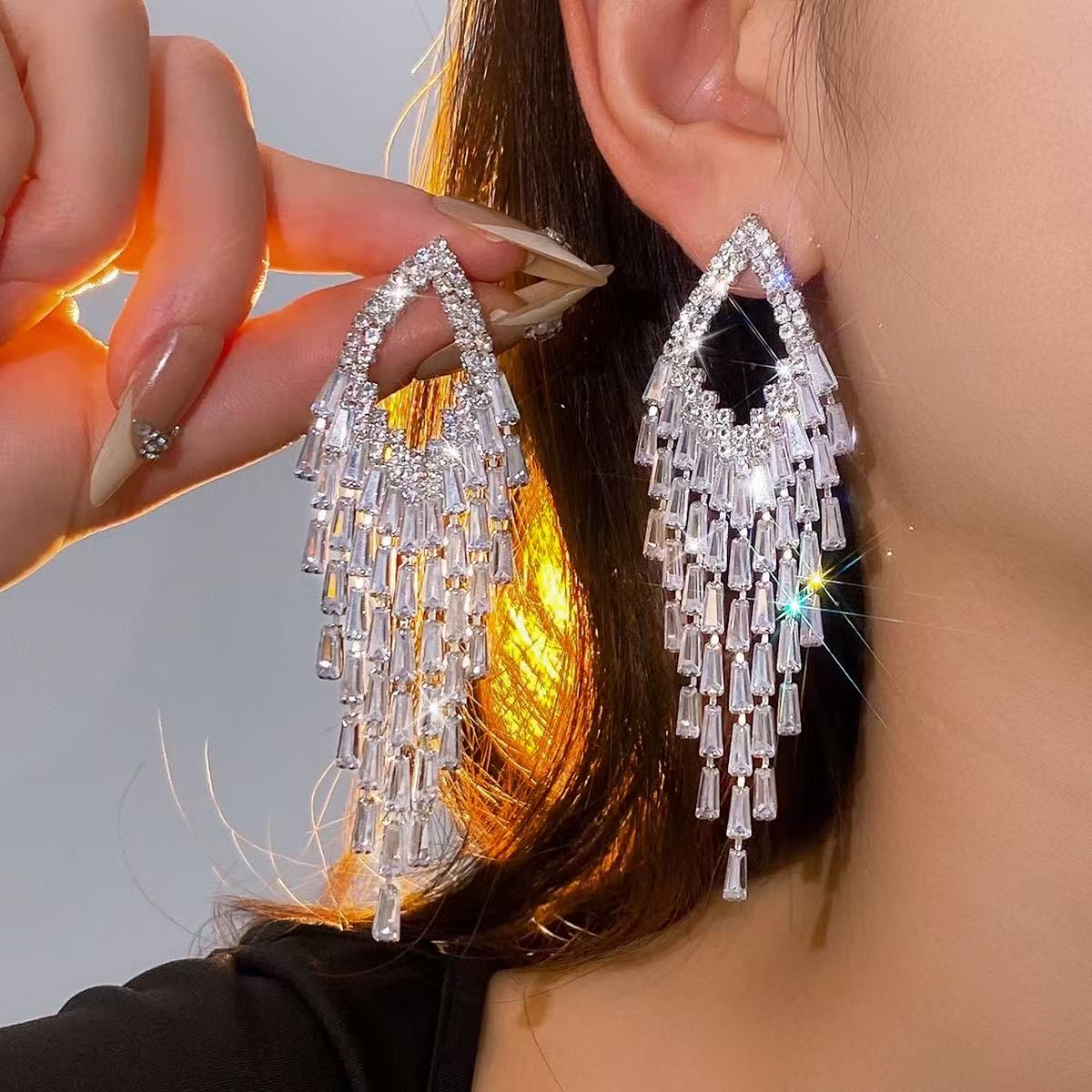 145e37cb09879a4d39b130d773cebcec AQUA BAGUETTE CRYSTAL TEARDROP TASSEL EARRINGS