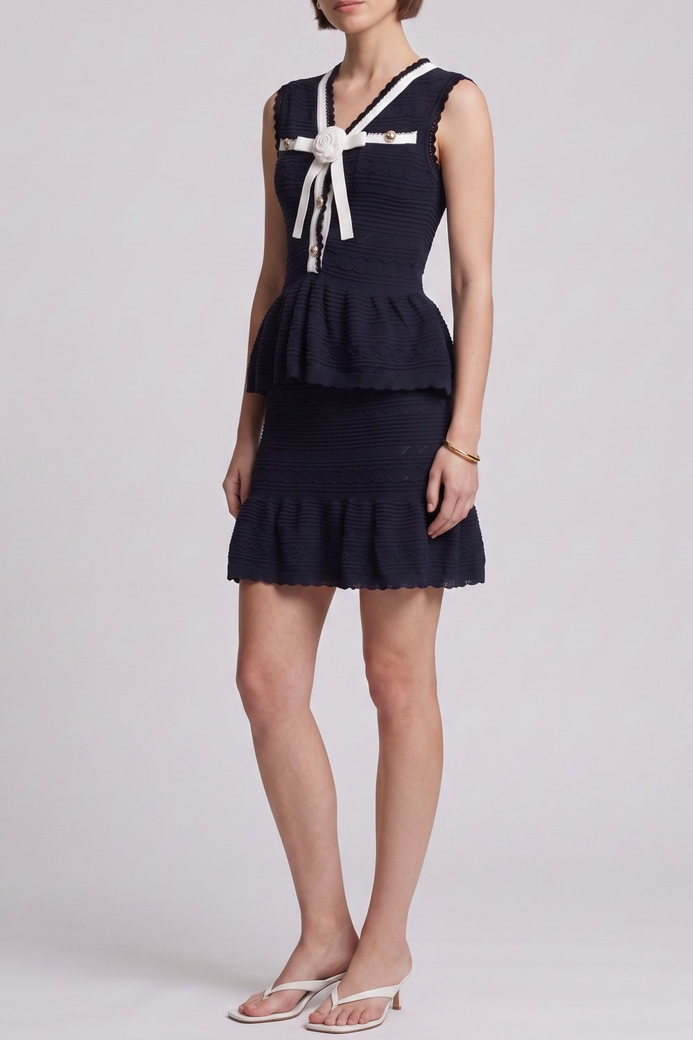 16817b12d852226b NAVY PEPLUM TOP & RUFFLE SKIRT 2PC SET