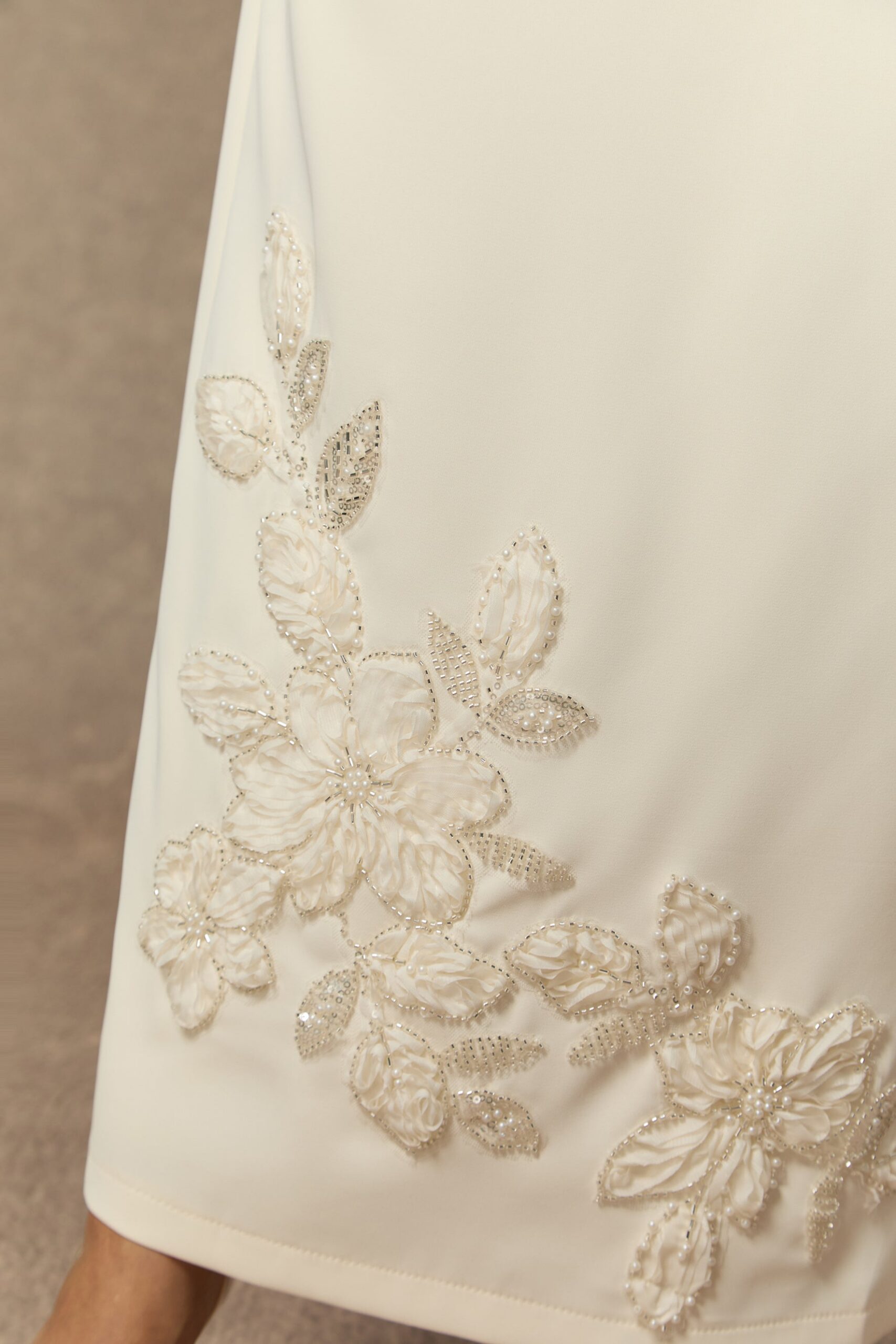 2025-11-20-lookbook1008-1 CREAM BEADED FLORAL PEPLUM TOP & MIDI SKIRT SET