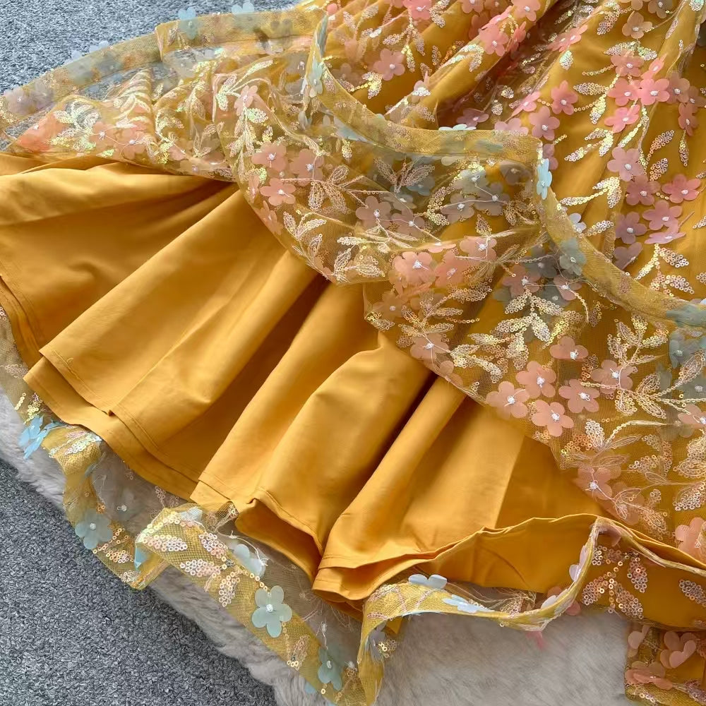 20260708152703_265_34 MUSTARD HALTER FLORAL EMBROIDERY SHEER TULLE MIDI DRESS