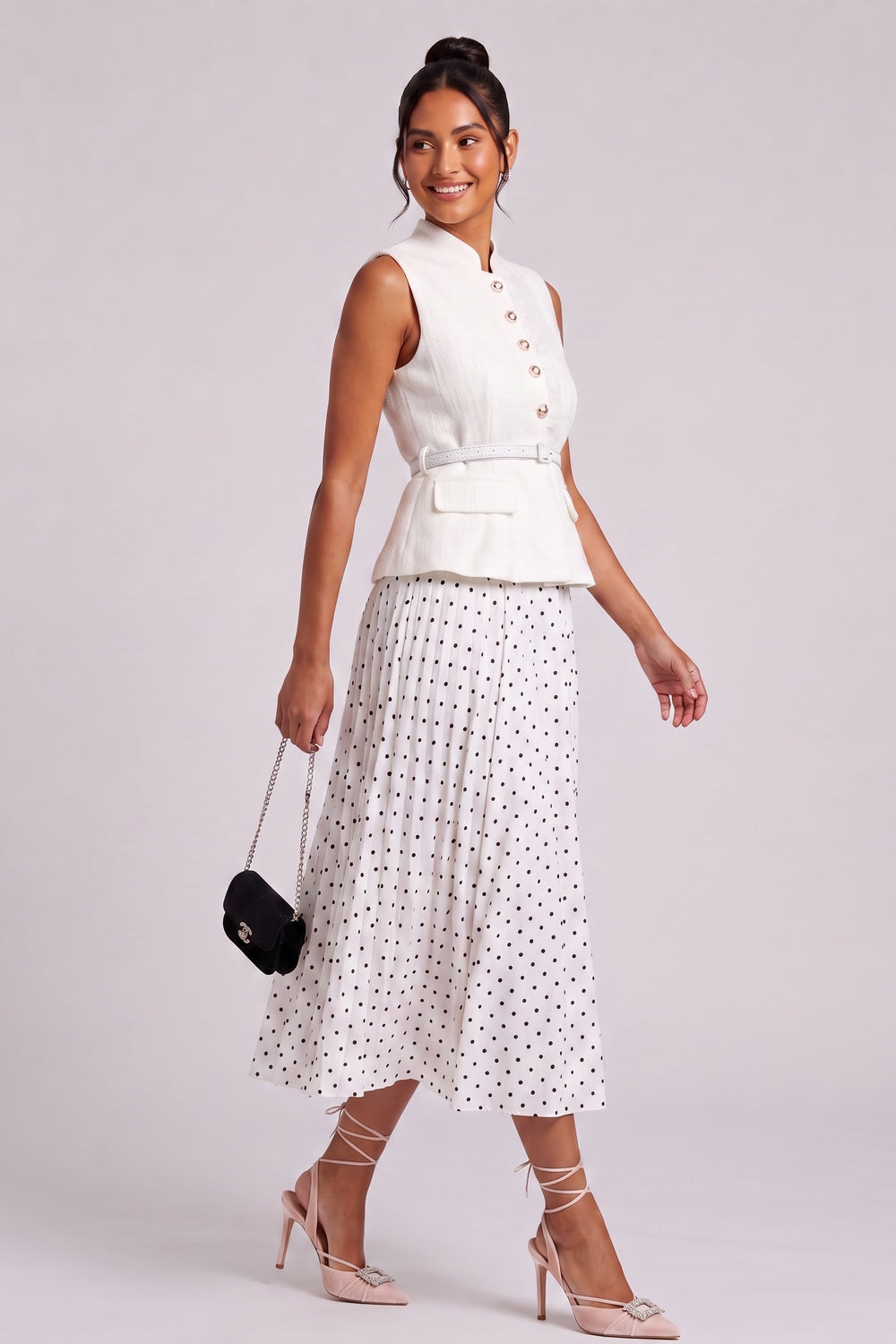3121960d37122a6d SLEEVELESS TEXTURED VEST & POLKA-DOT MIDI SKIRT SET