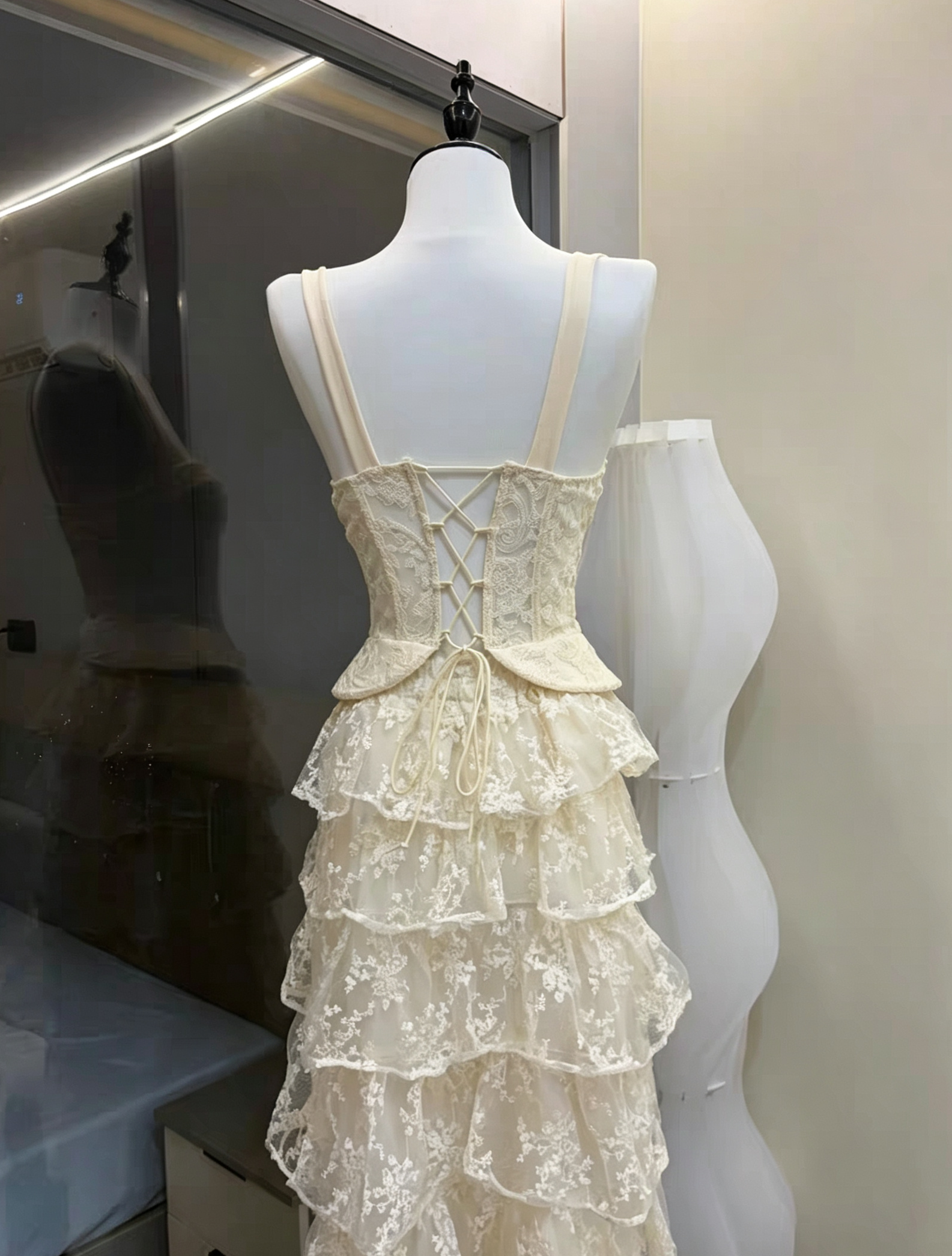 3_6ebaecc8-3538-482b-bae8-3f7e7e561b2b IVORY LACE CORSET PEPLUM TOP & HIGH LOW SKIRT SET