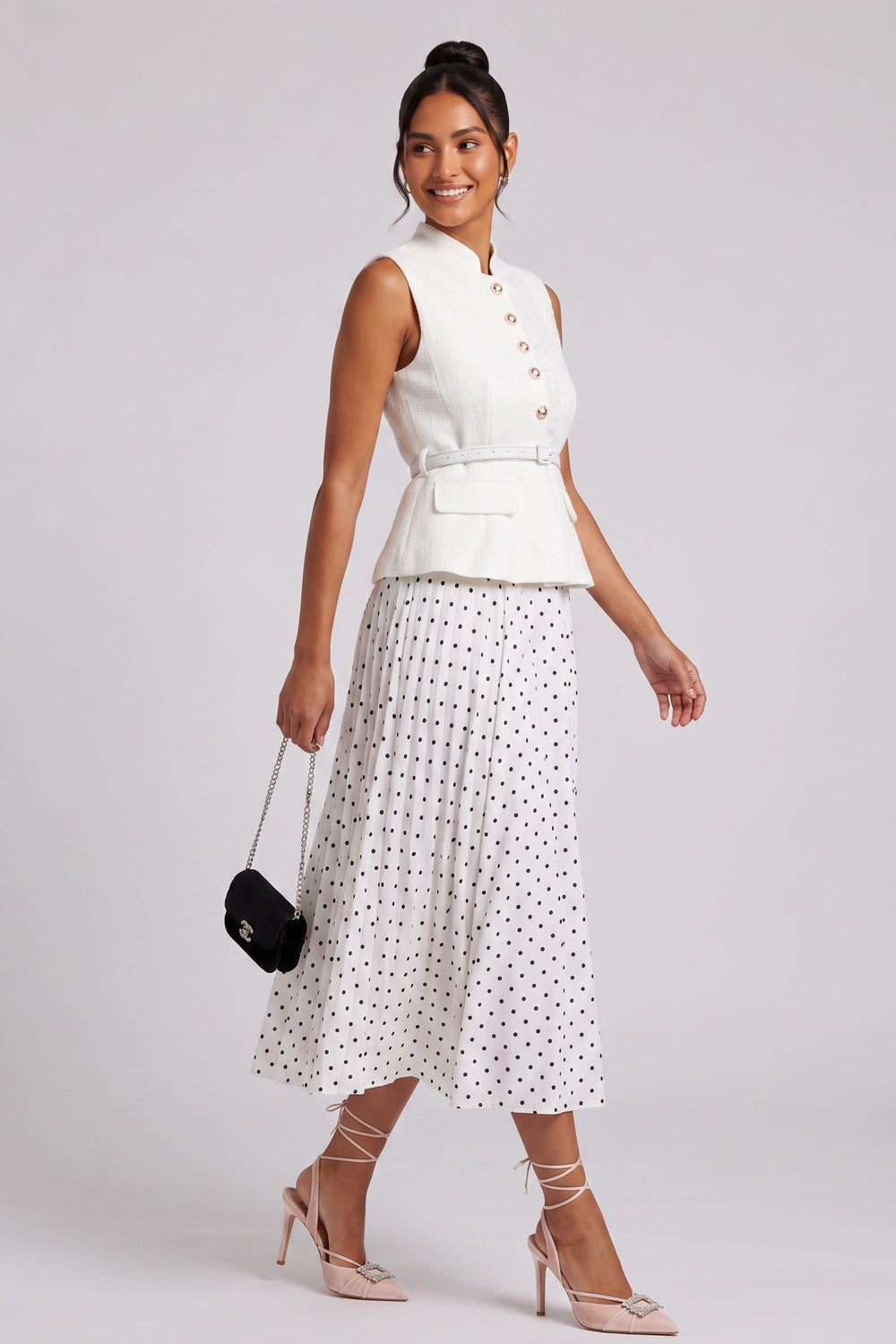 6c11b6d8dde298e2 SLEEVELESS TEXTURED VEST & POLKA-DOT MIDI SKIRT SET