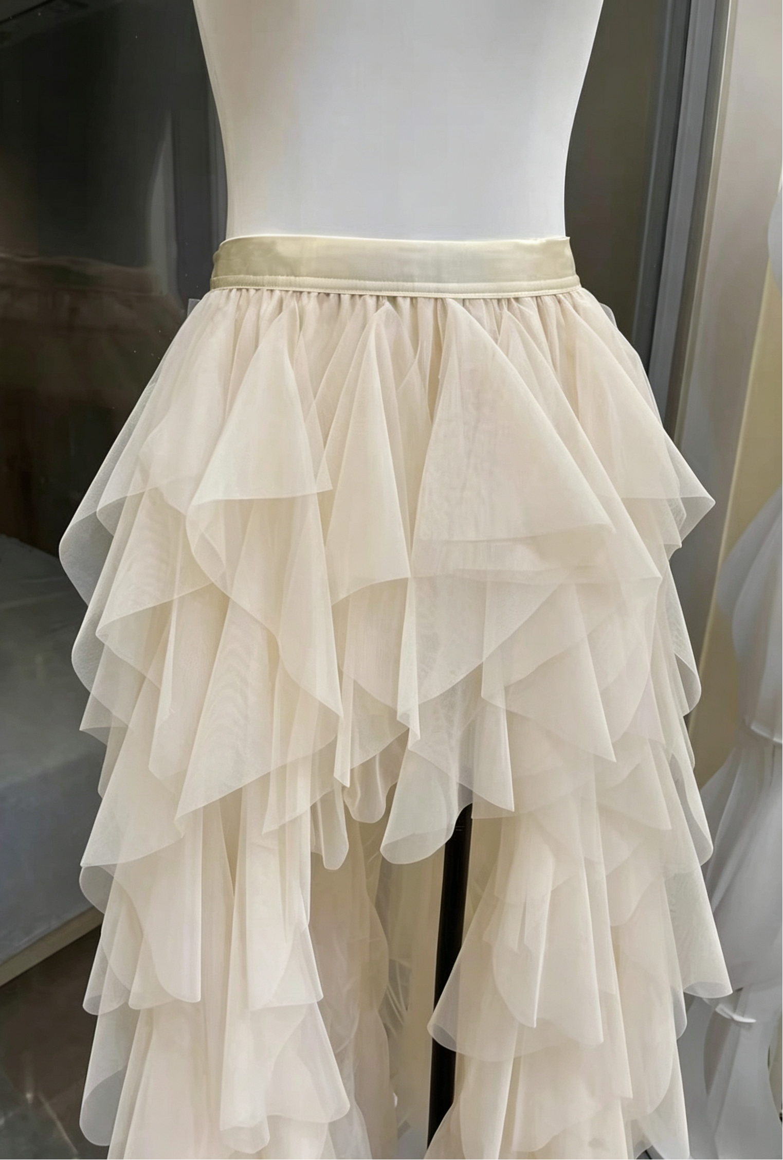 7_b18541f8-a1fe-40ff-8512-ba851b6d466d CREAM STRAPLESS PEARL CORSET TOP & HIGH-LOW RUFFLE TULLE SKIRT SET