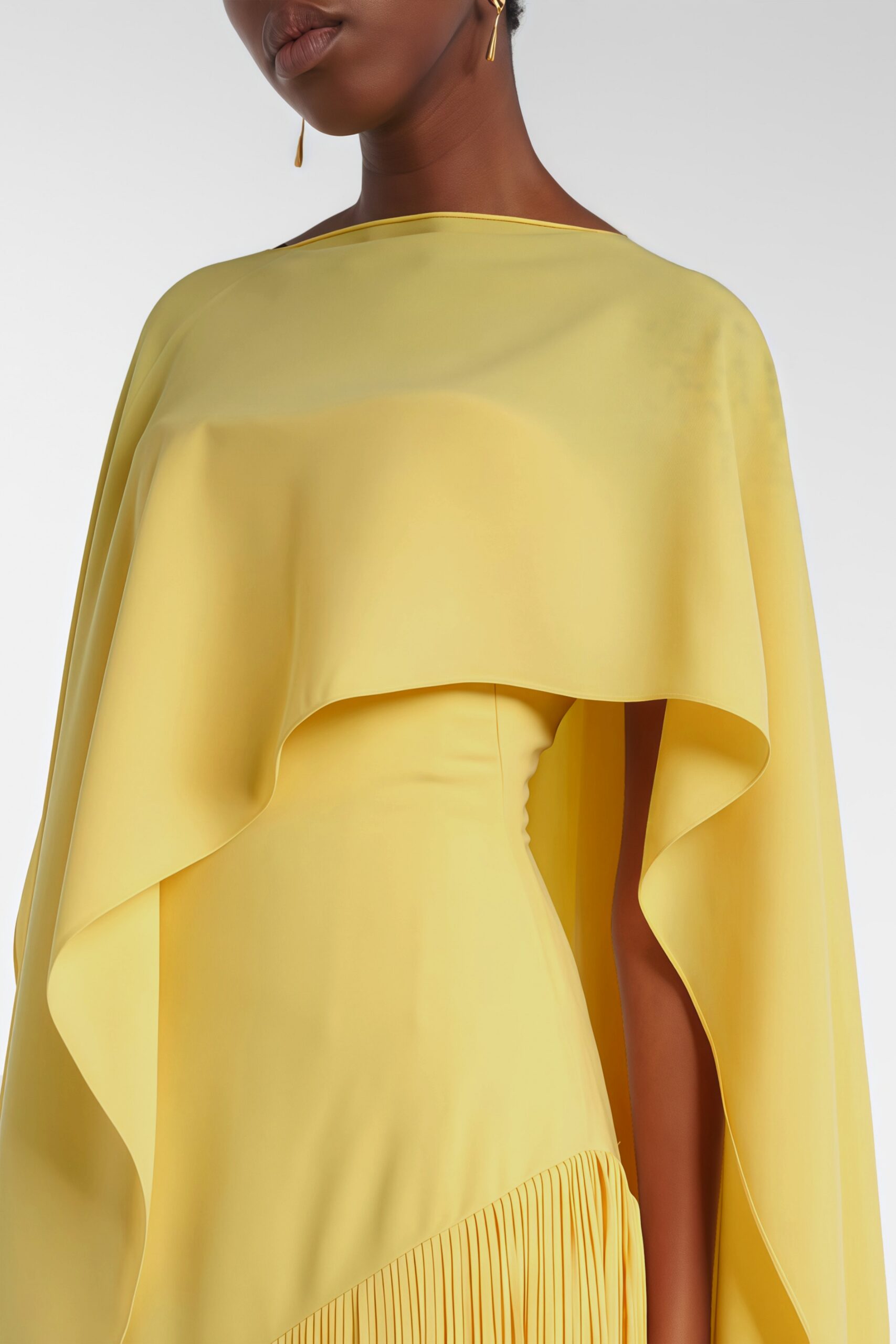 PALE YELLOW CAPE OVERLAY DIAGONAL FRINGE MERMAID MAXI GOWN