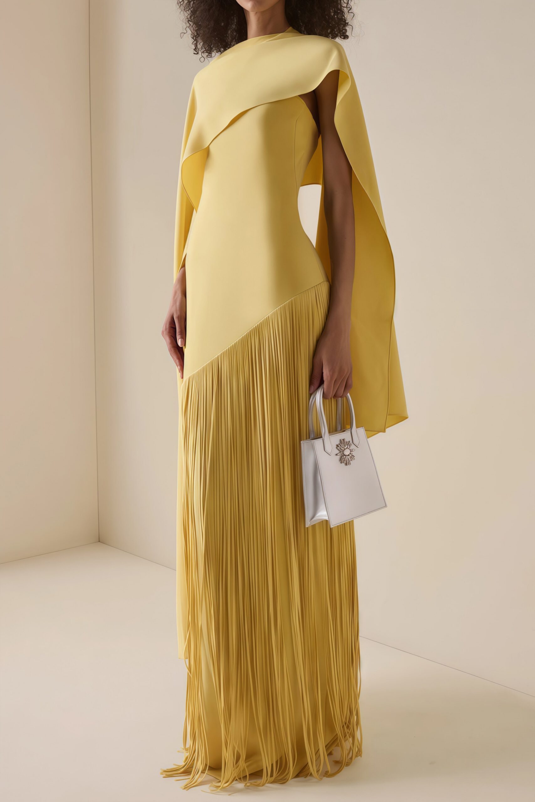 PALE YELLOW CAPE OVERLAY DIAGONAL FRINGE MERMAID MAXI GOWN