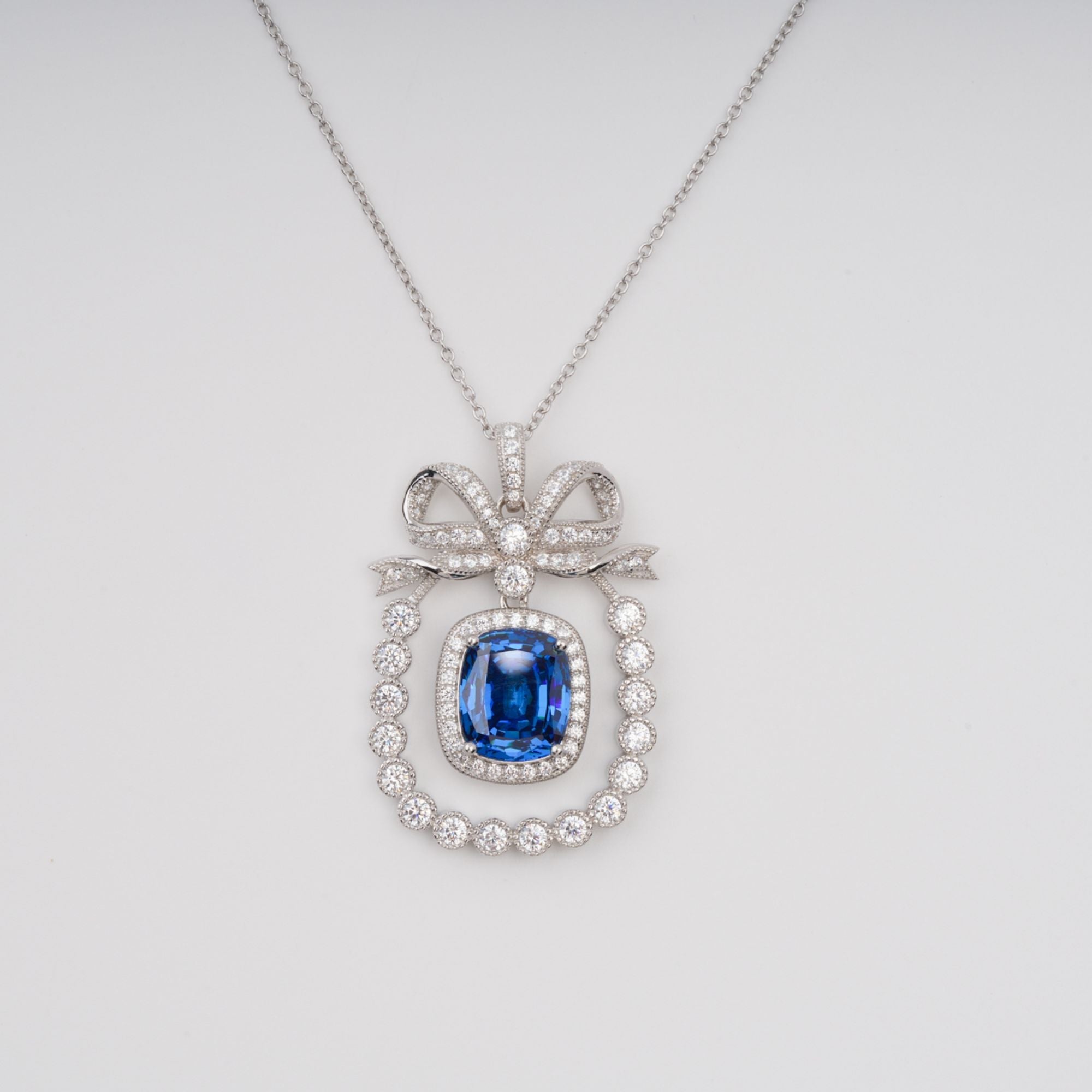 DSC07104_d74b5fda-5570-4294-9797-857d4d92ac09 KAISU BLUE BOW PENDANT NECKLACE, SILVER GEMSTONE