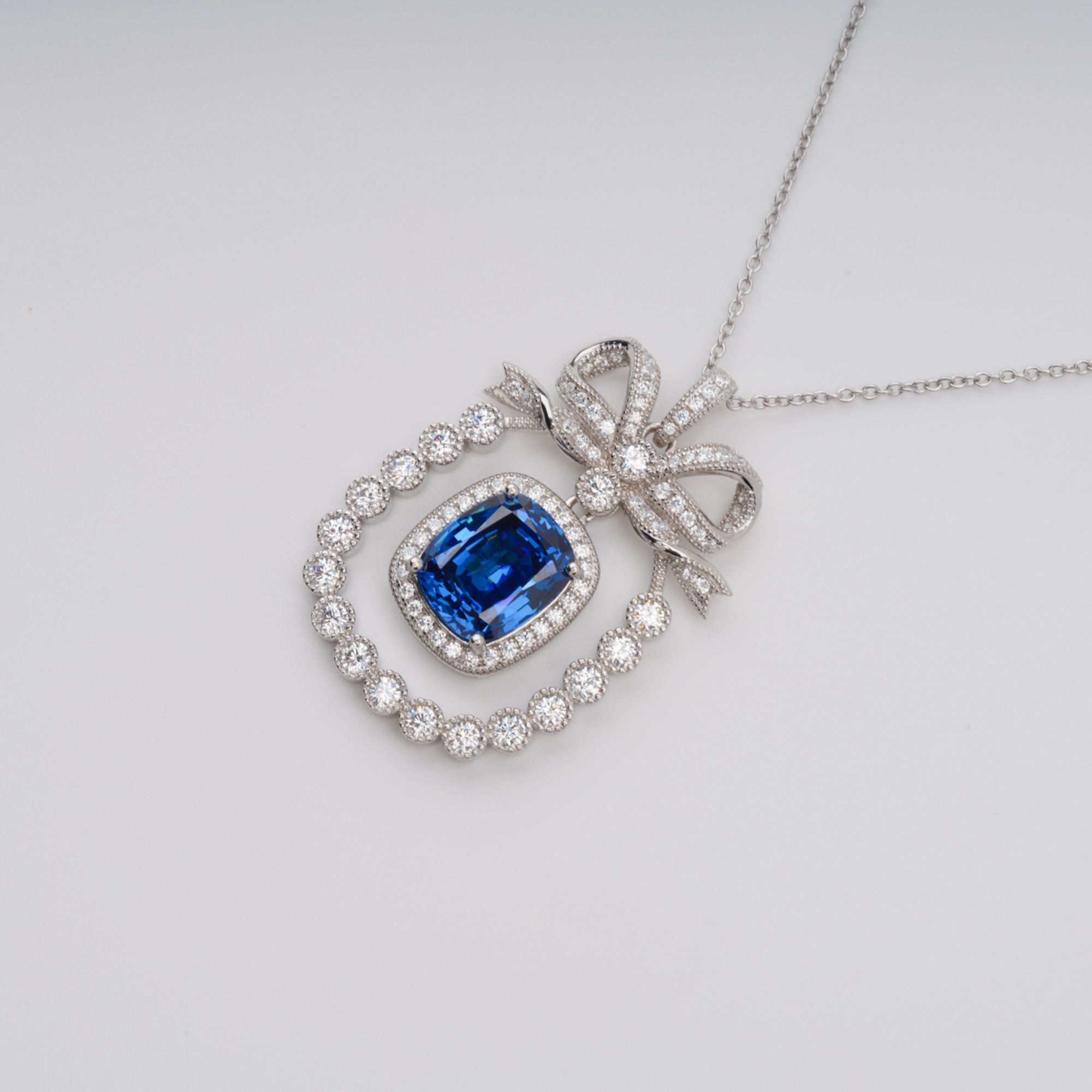 DSC07106_11b08292-fb75-40da-bba6-328ceb347fd1 KAISU BLUE BOW PENDANT NECKLACE, SILVER GEMSTONE