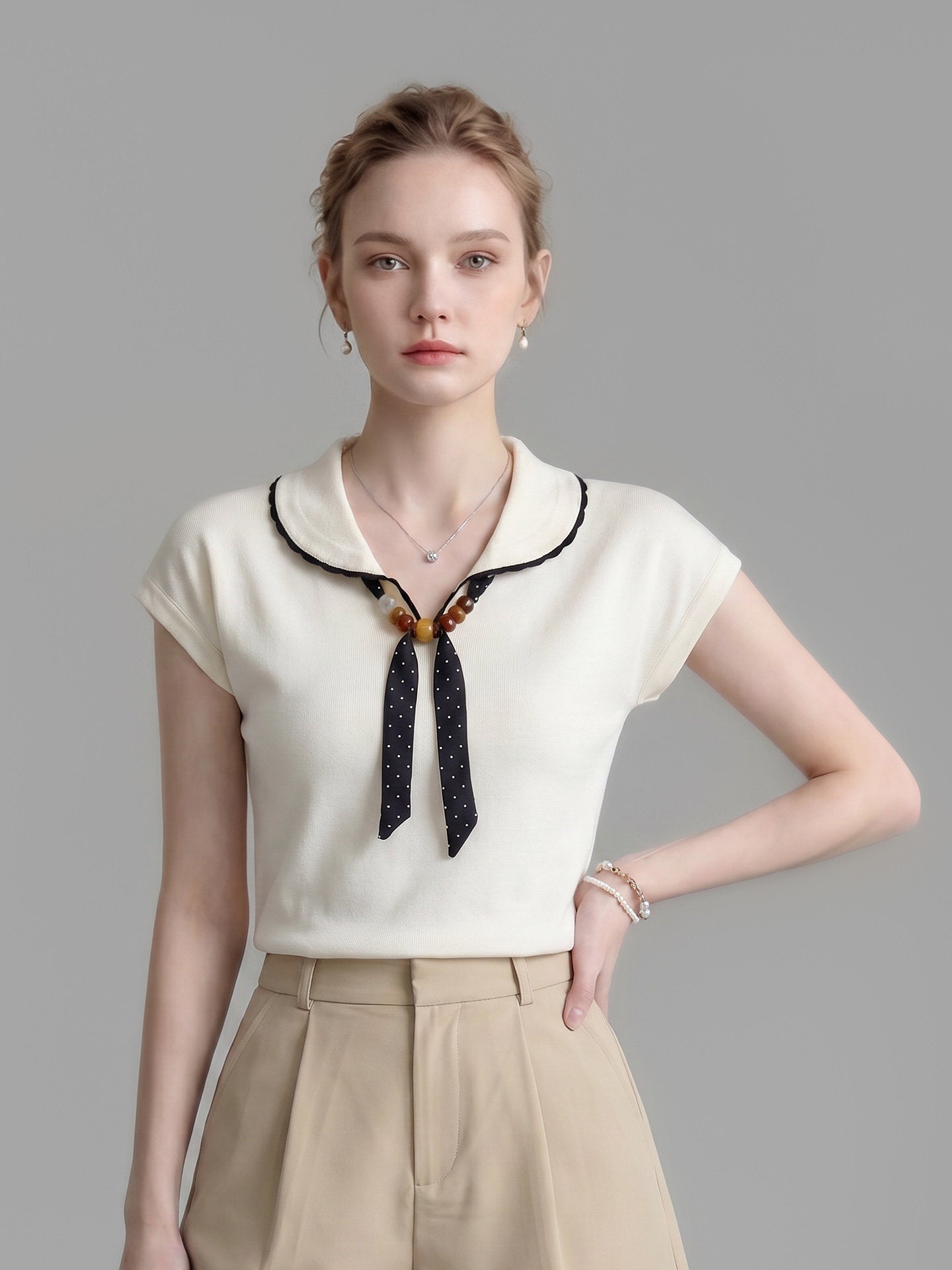 O1CN01YXrSDz1fP8cP6d38x__163593998 SCALLOPED COLLAR POLKA DOT BOW CAP SLEEVE KNIT TOP