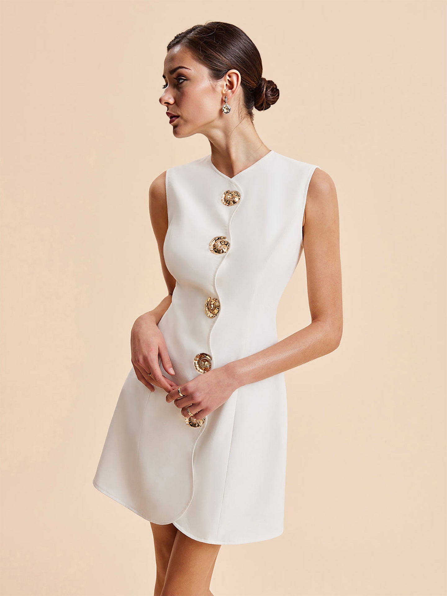 SLEEVELESS GOLD BUTTON WAVY HEM MINI DRESS