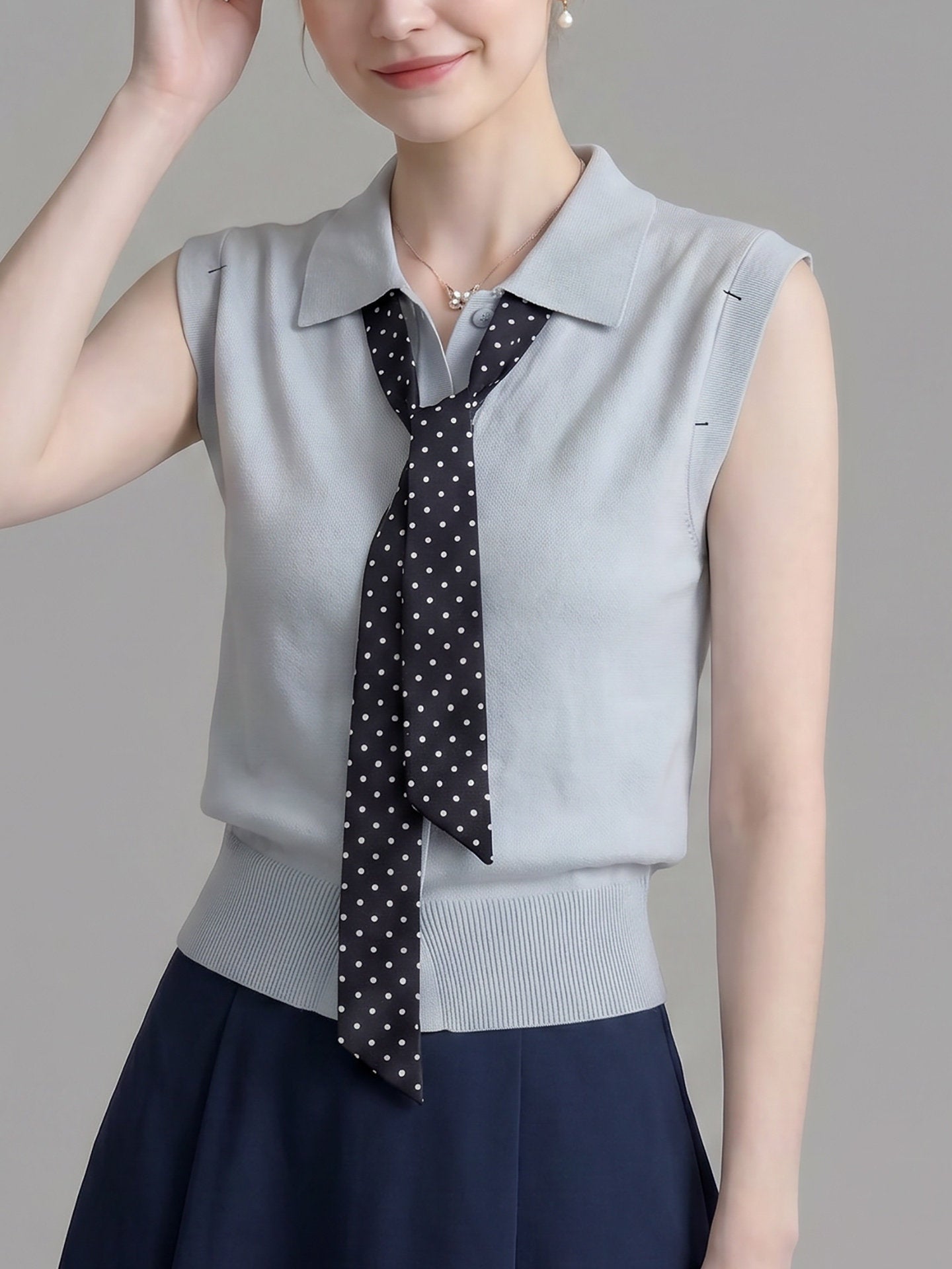 POLO SLEEVELESS KNIT TOP W/ POLKA DOT TIE