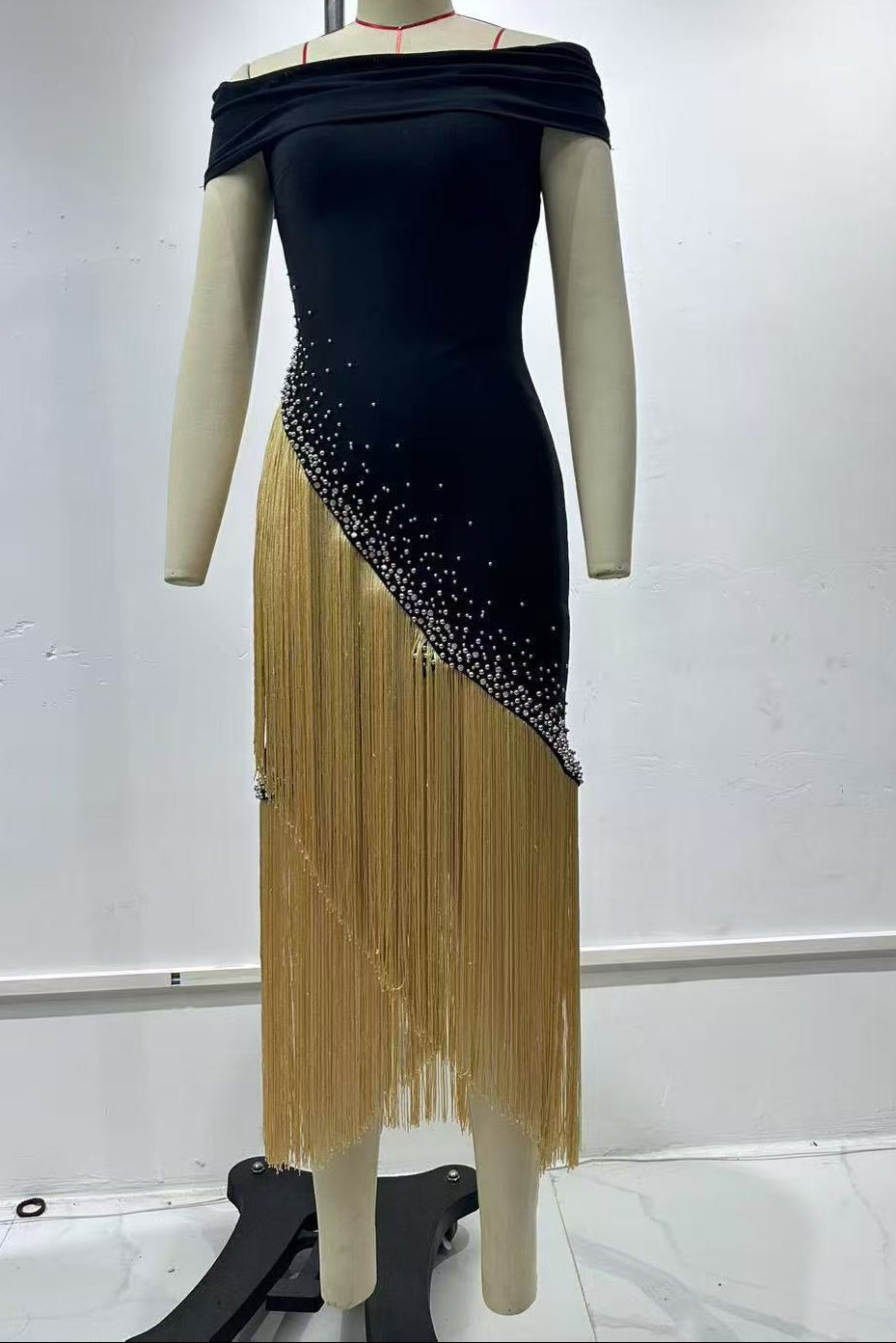 aa19ea4fd57c767a4b43ddec2526d505 TATA CHIC CONTOUR OFF SHOULDER GOLD FRINGE BANDAGE MAXI DRESS