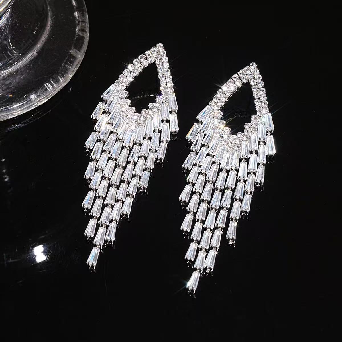 bd5cc4859a5cd51738ef406cac796499 AQUA BAGUETTE CRYSTAL TEARDROP TASSEL EARRINGS