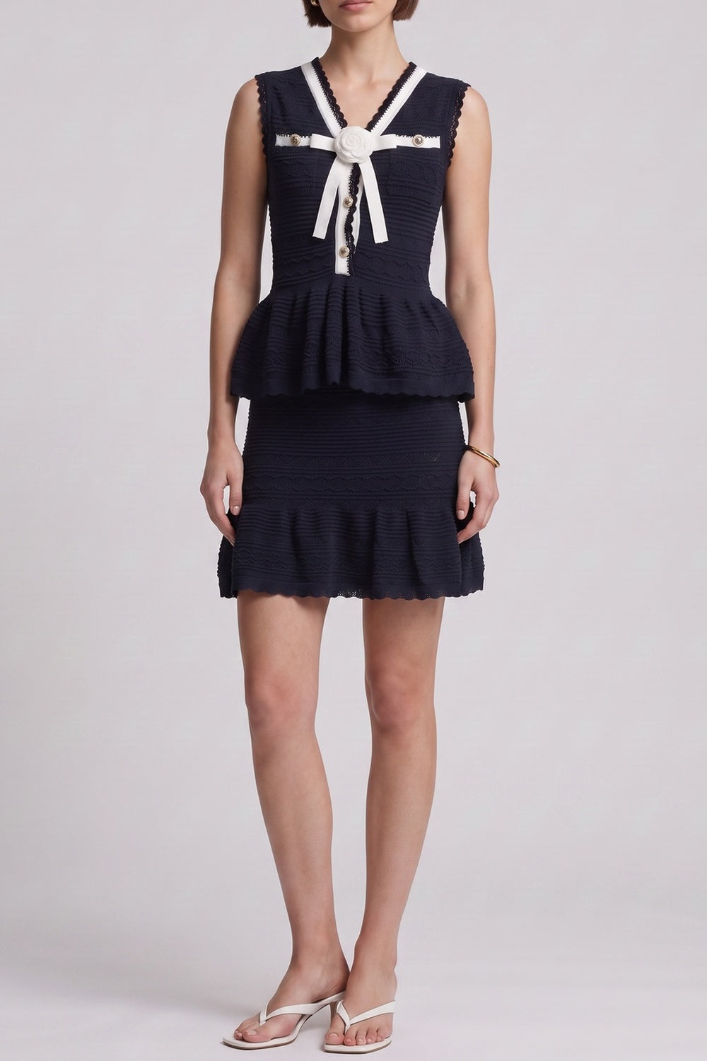 d7dd96318d51c114 NAVY PEPLUM TOP & RUFFLE SKIRT 2PC SET